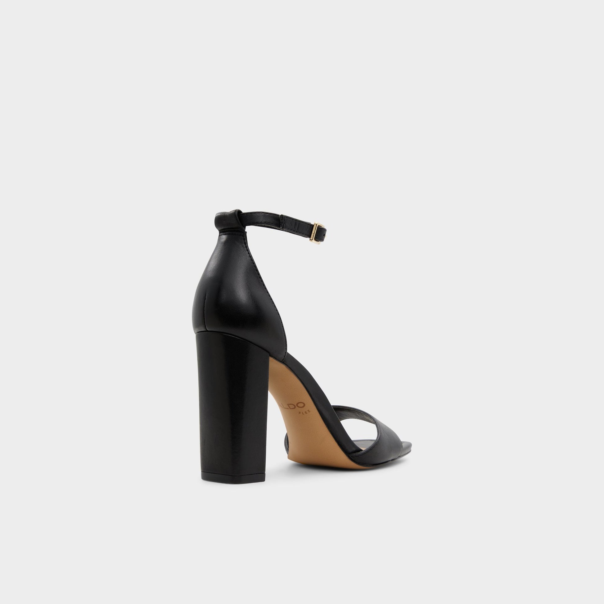 Three-quarter angle of Black Enaegyn Strappy heeled sandal's back side