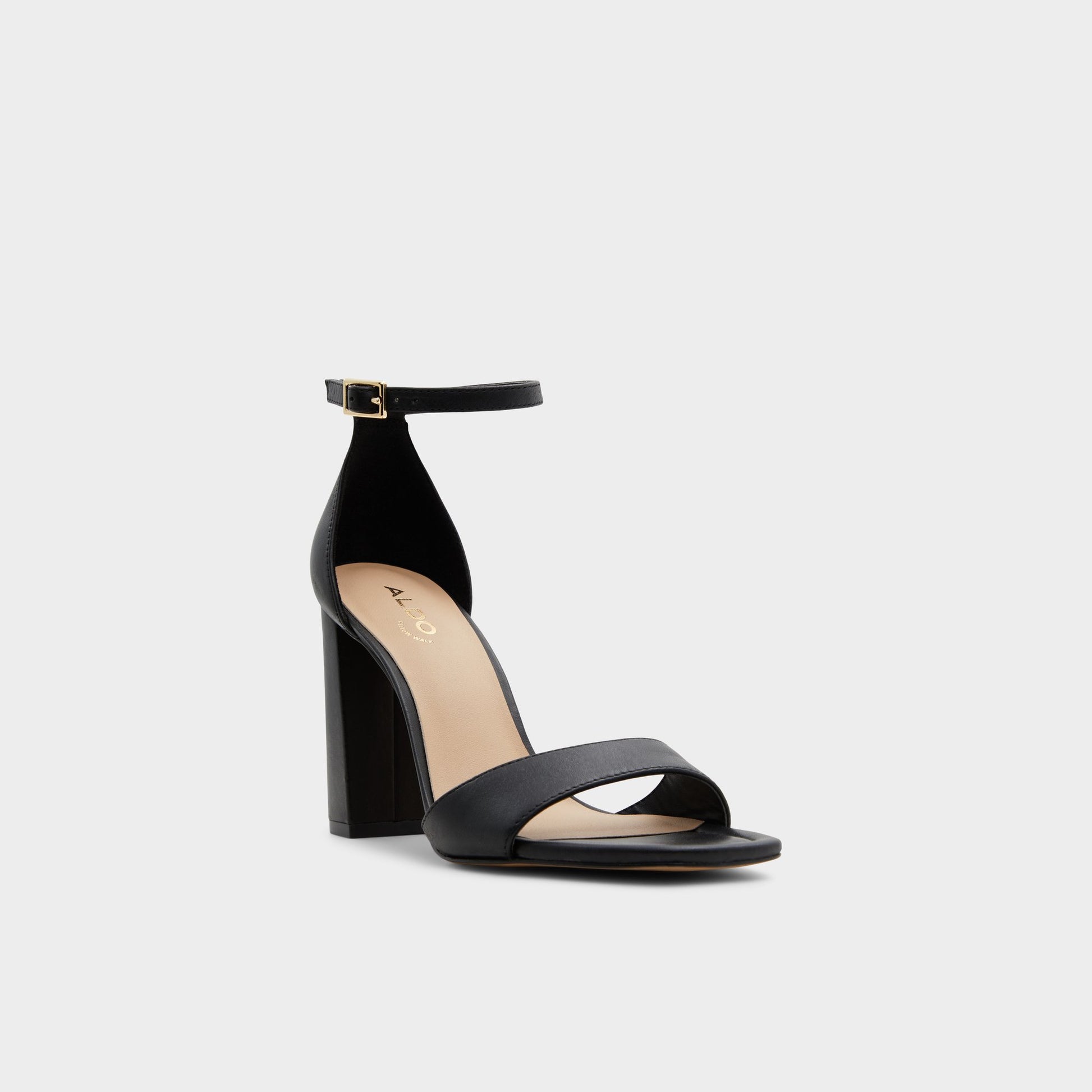 Three-quarter angle of Black Enaegyn Strappy heeled sandal's front side