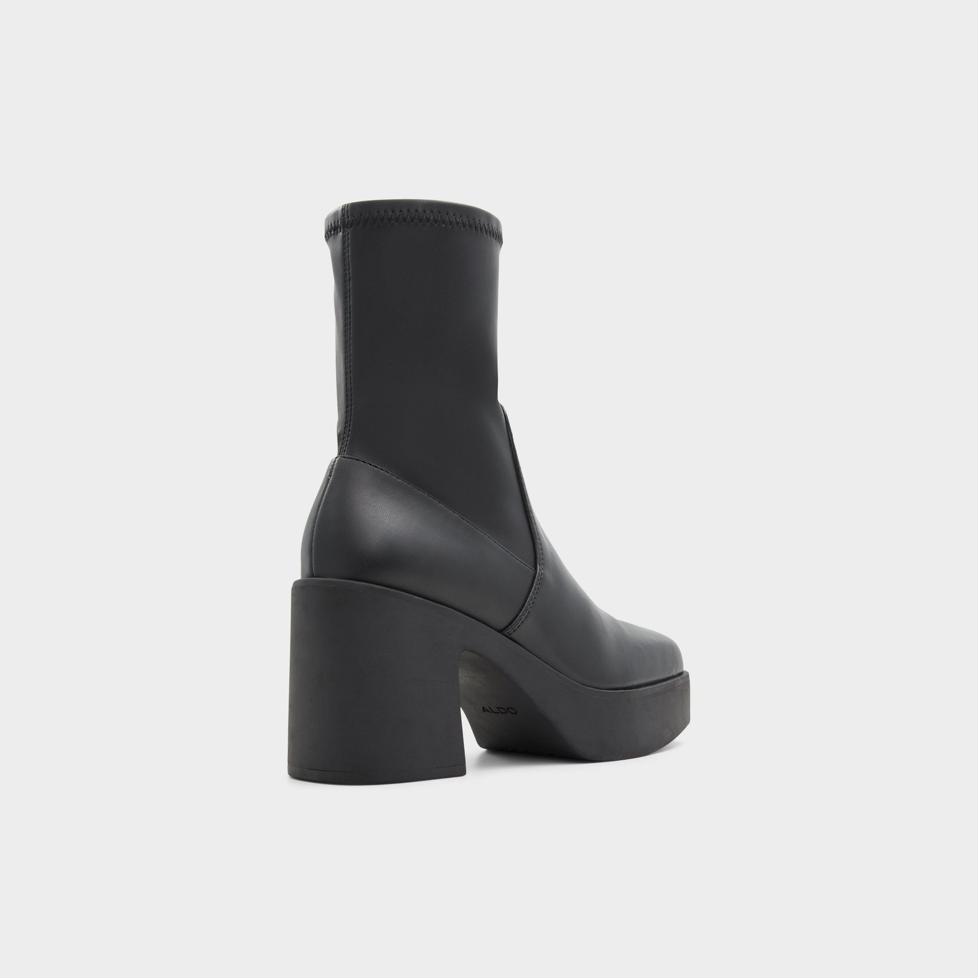 Three-quarter angle of Black Upstep Ankle boot's back side