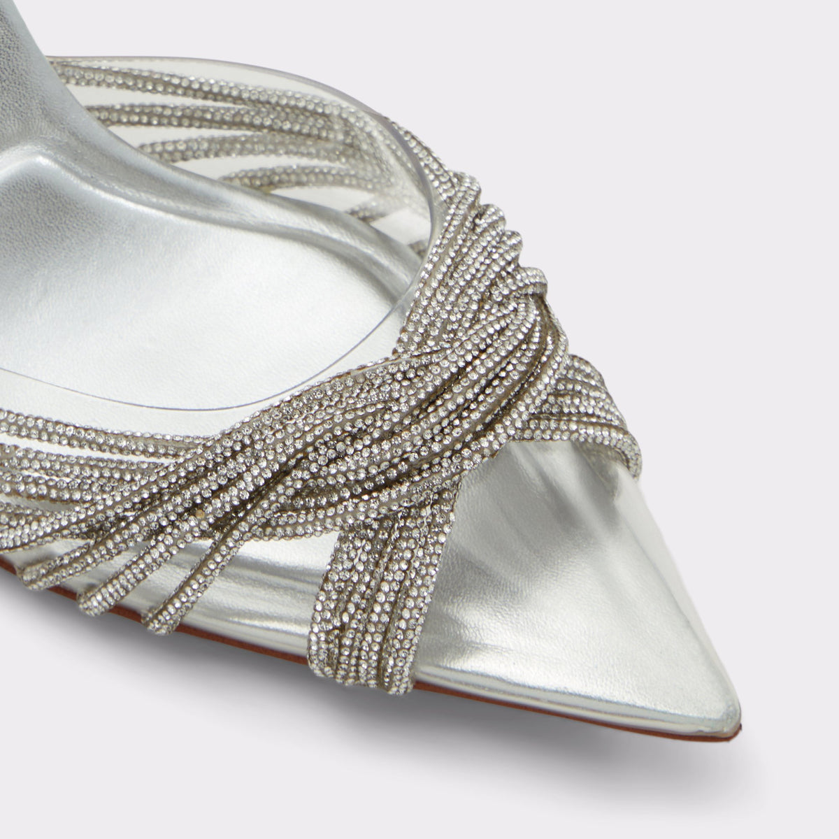 Close-up of the Silver Thubeth Sling back high heel
