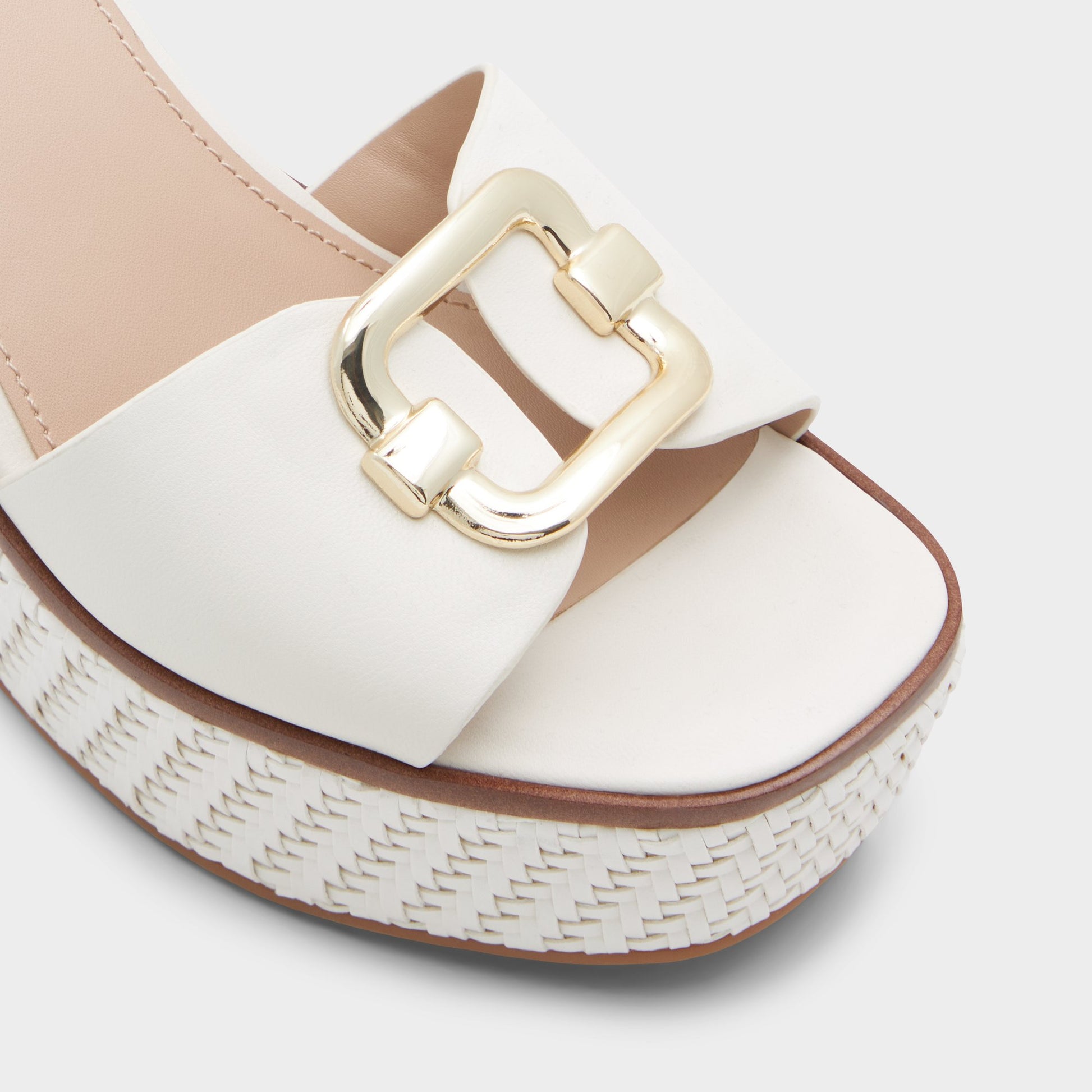 Close-up of the Open White Carrabriria Wedge sandal