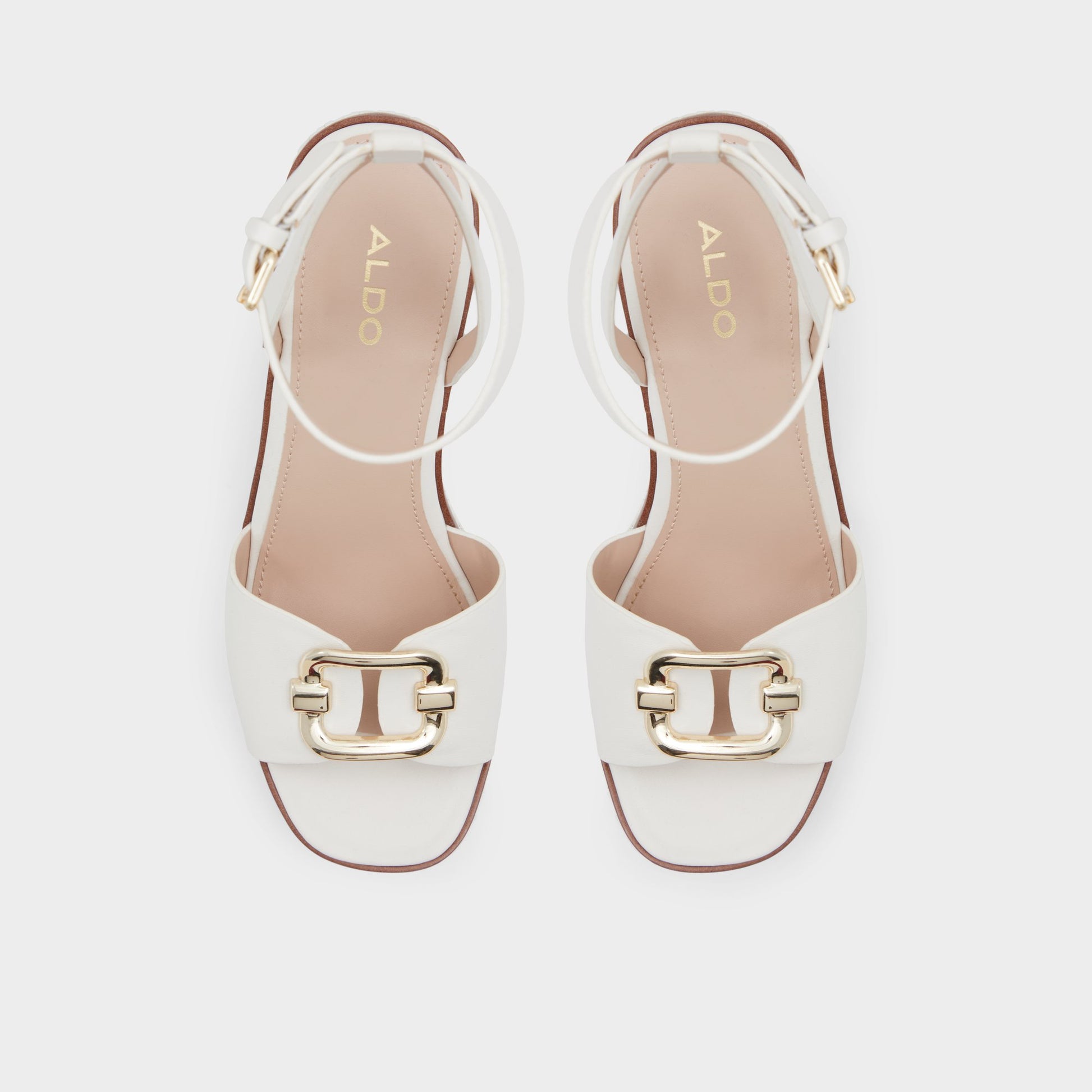 Top-down view of the Open White Carrabriria Wedge sandal