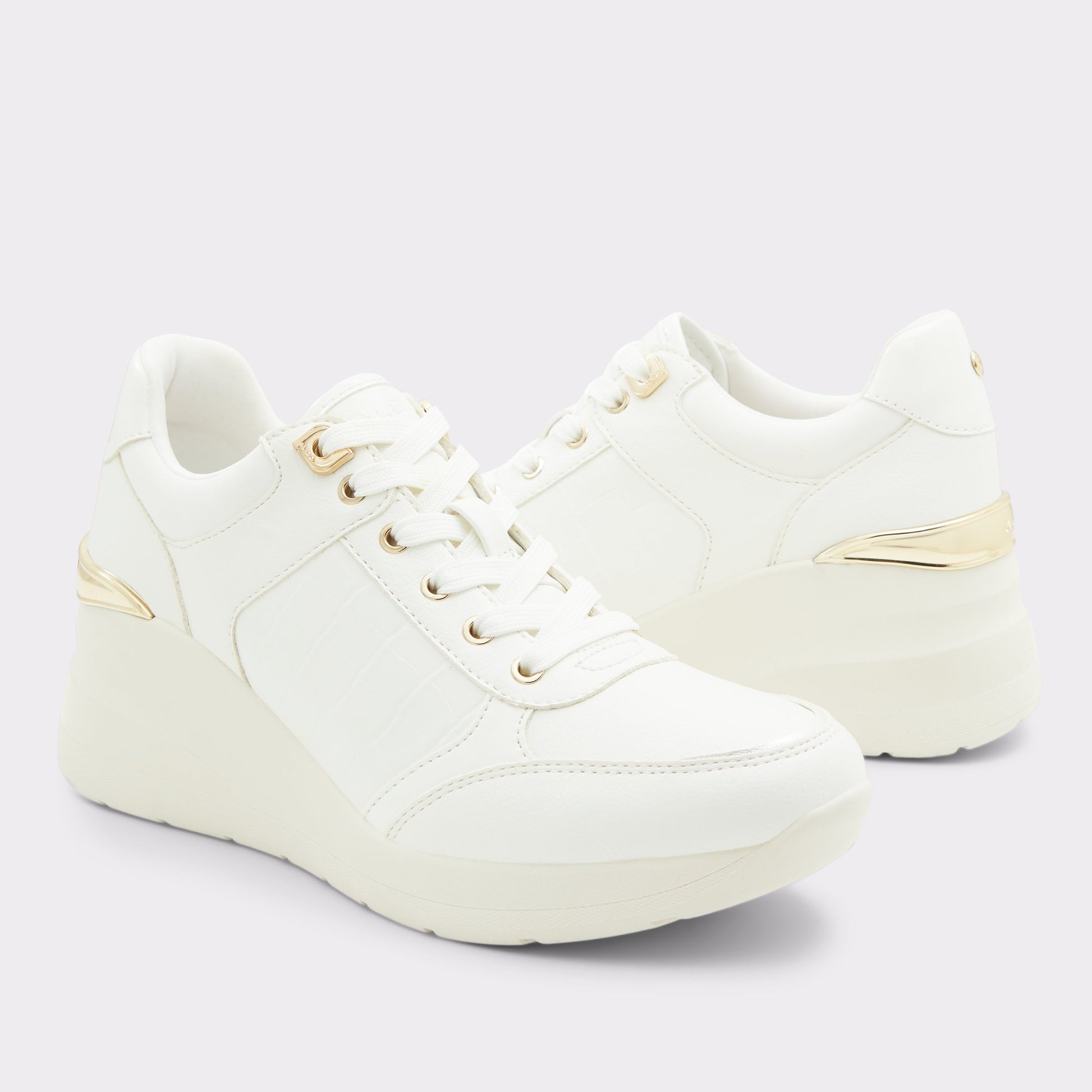Highlighted view of a pair of Other white Iconistep s