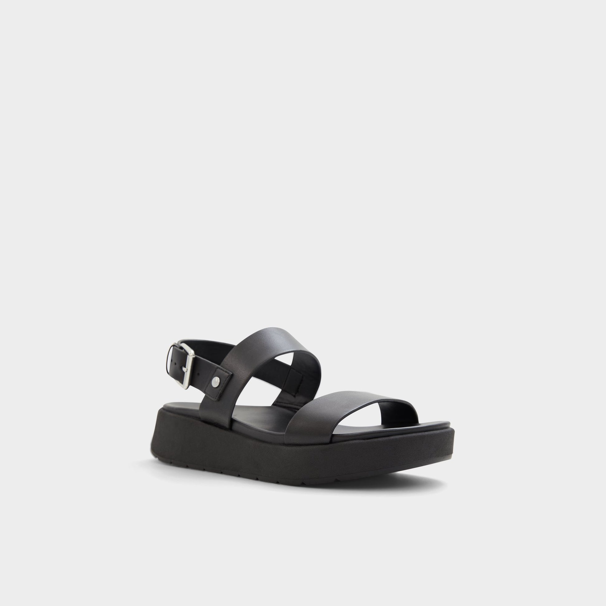 Three-quarter angle of Black Silyia Flat sandal's front side
