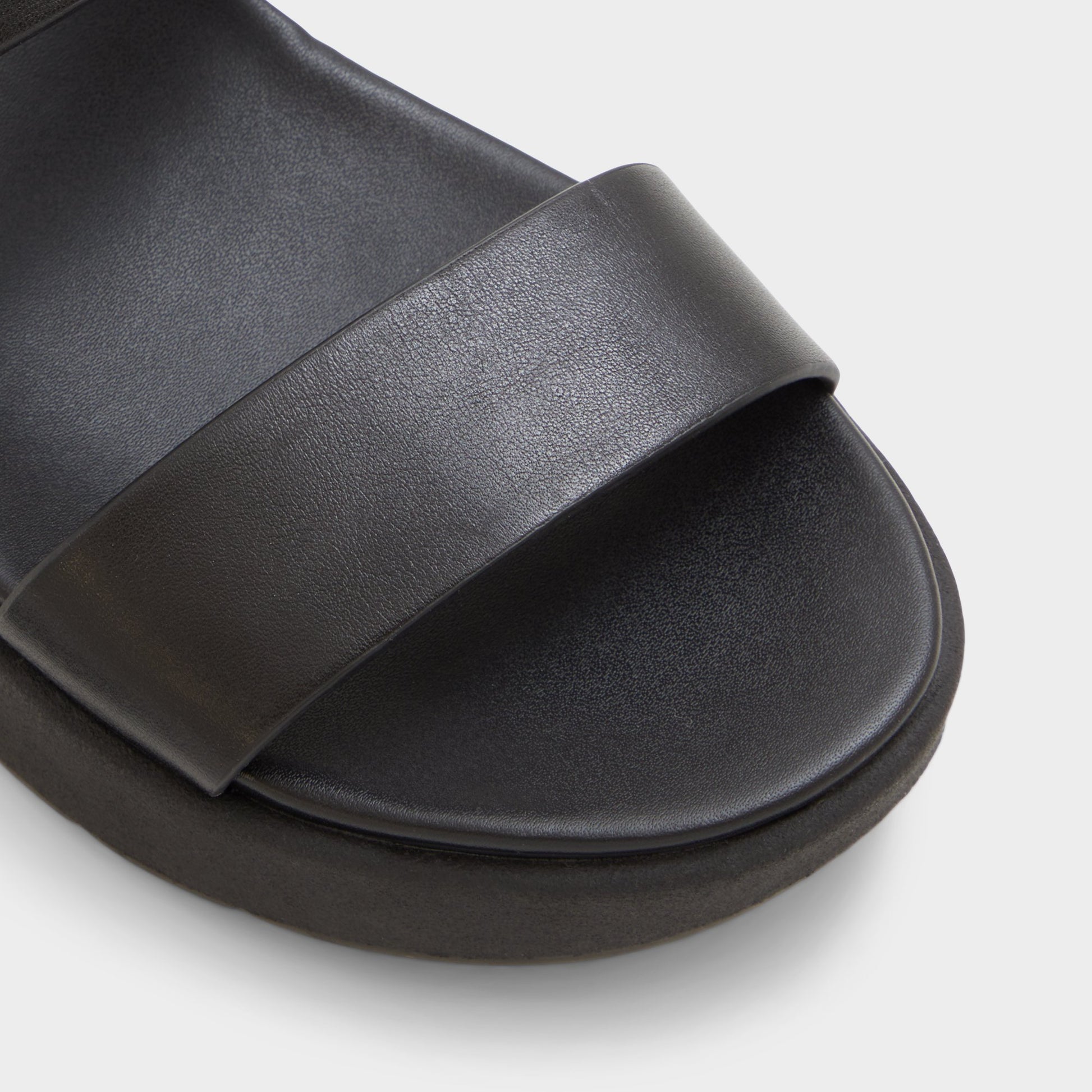 Close-up of the Black Silyia Flat sandal