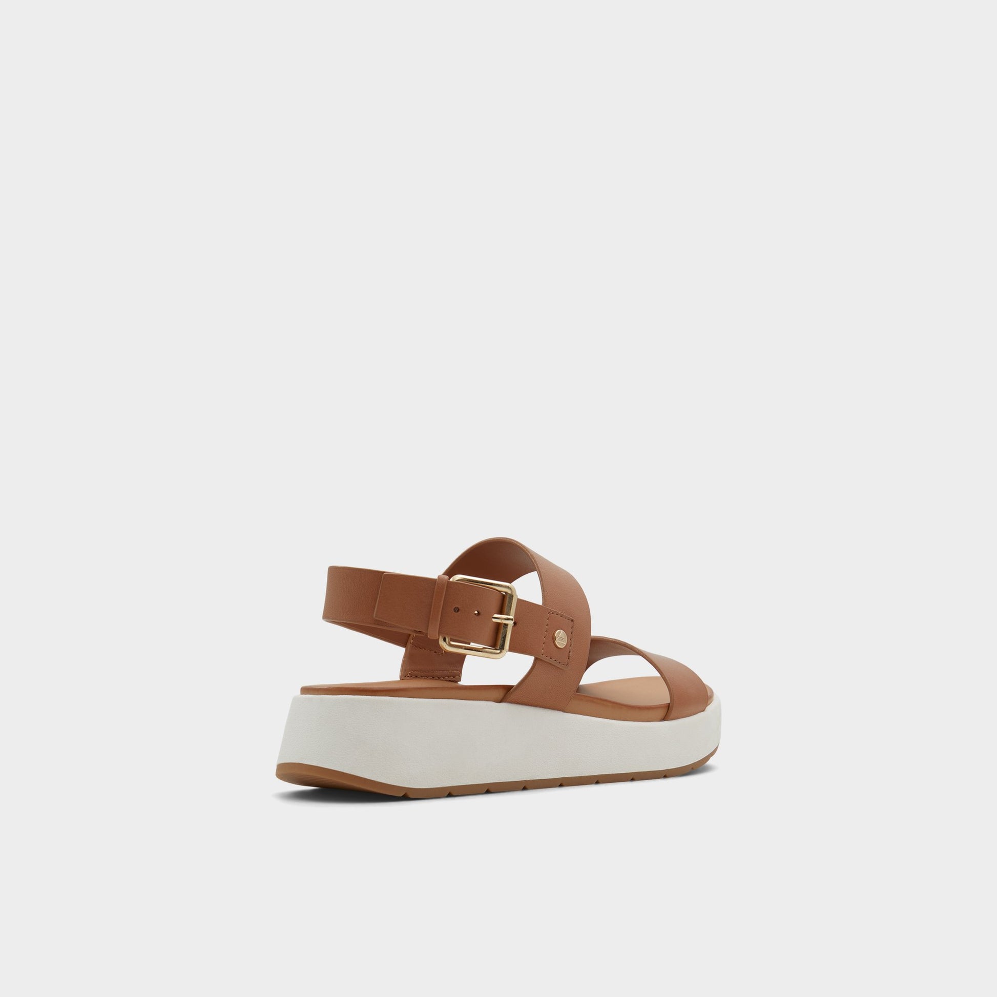Three-quarter angle of Dark Beige Silyia Flat sandal's back side
