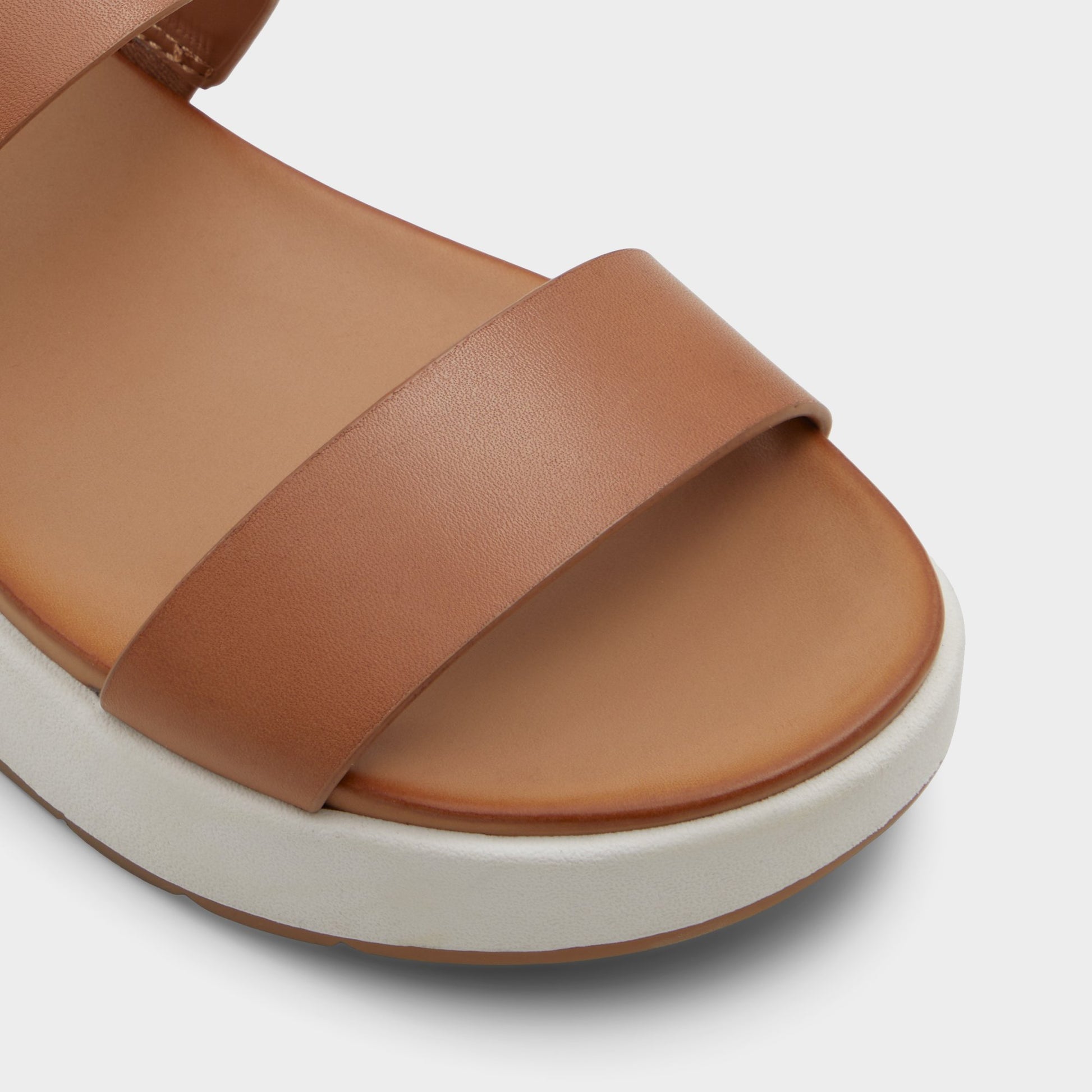 Close-up of the Dark Beige Silyia Flat sandal