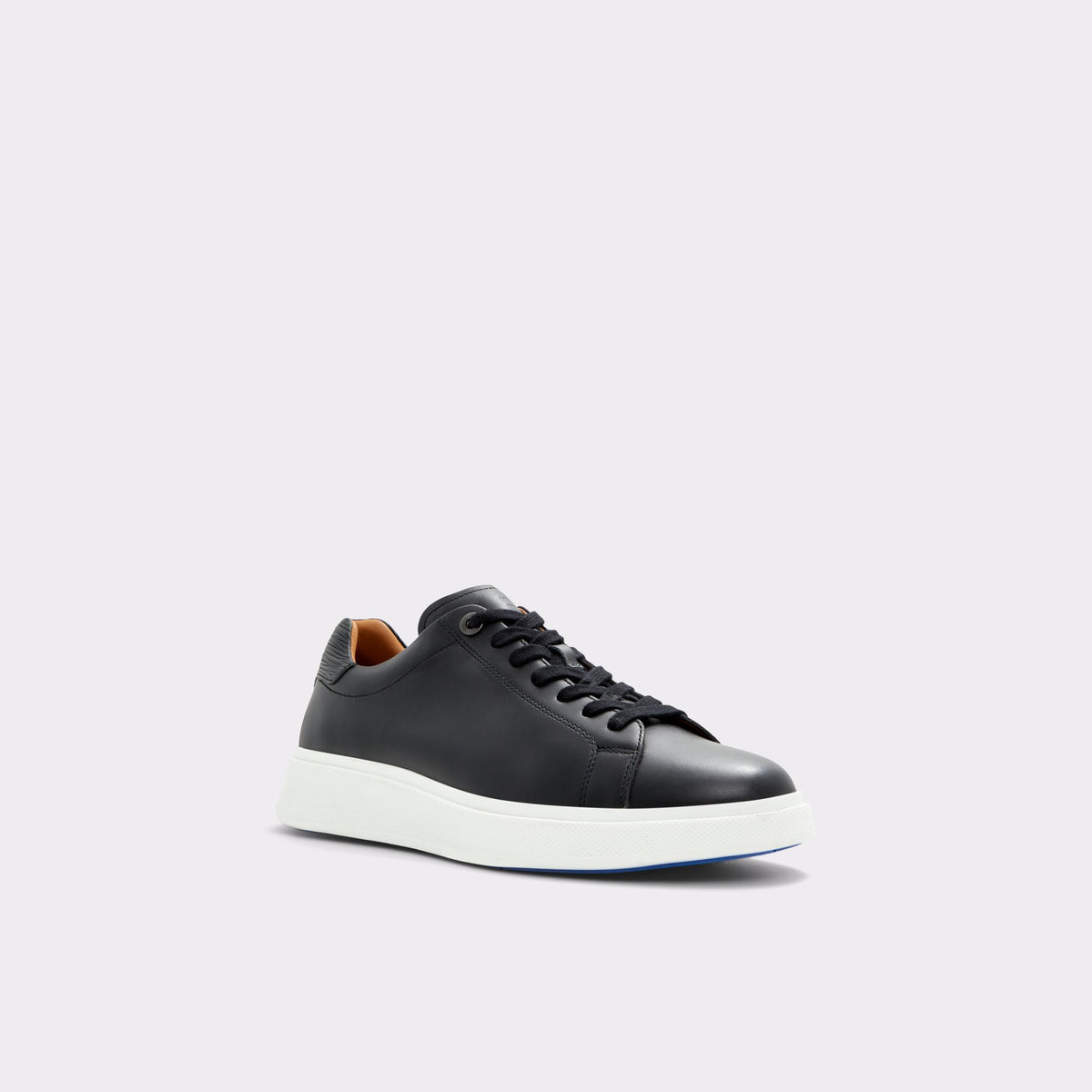 Three-quarter angle of Black Umpire Low Top Sneaker's front side