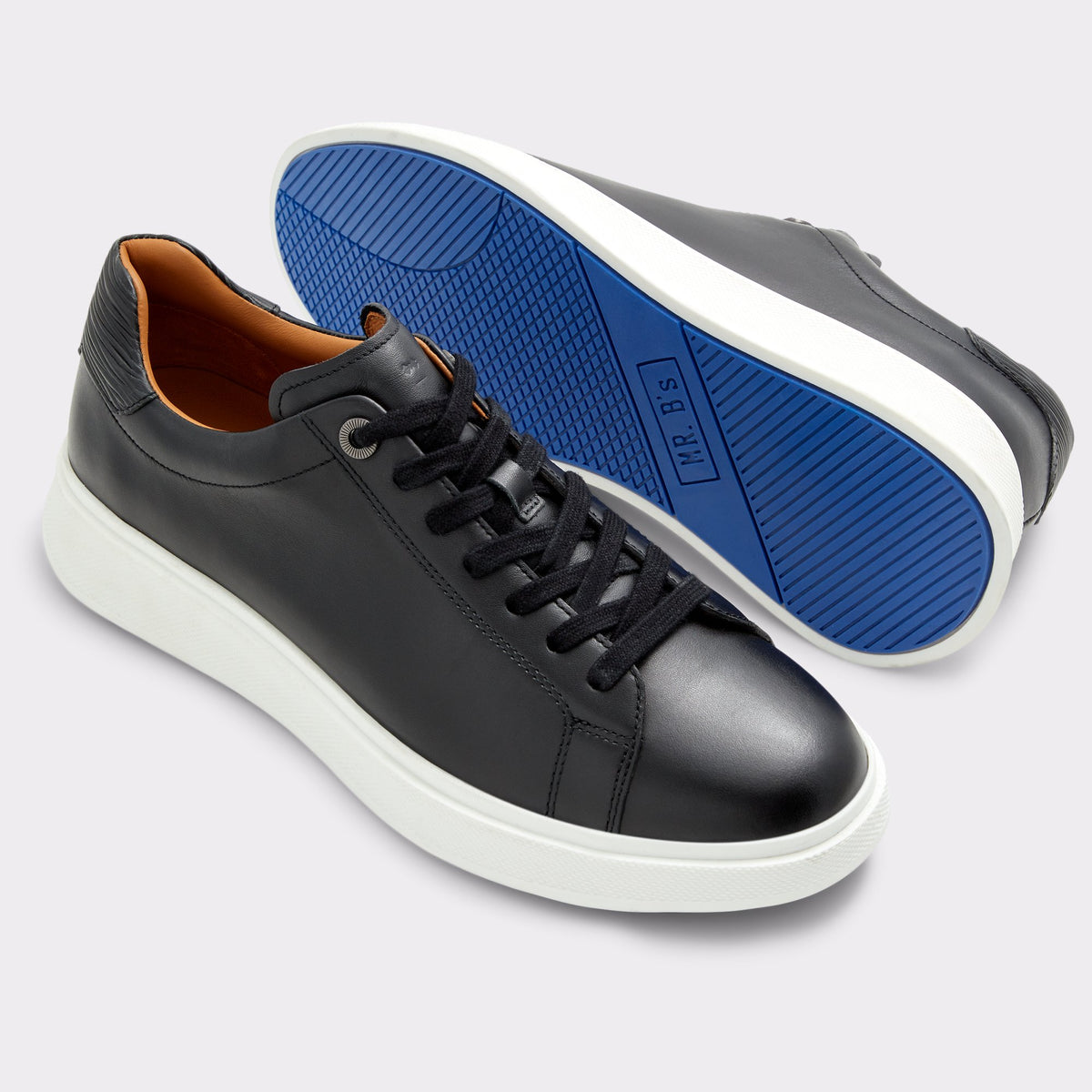 Highlighted view of a pair of Black Umpire Low Top Sneakers