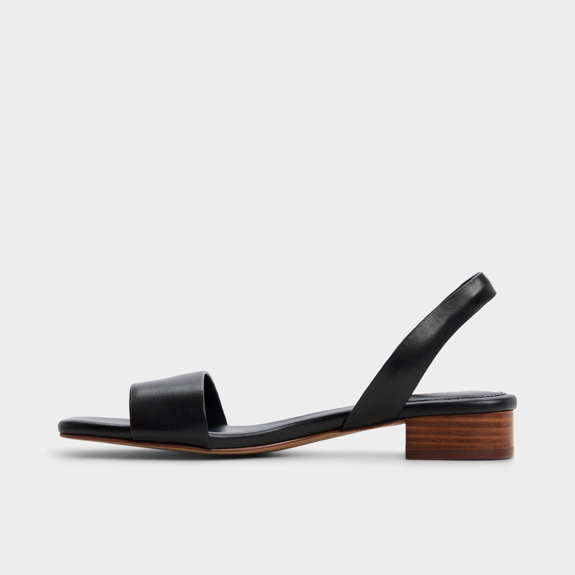 Side view of Black Dorenna Black strappy sandal