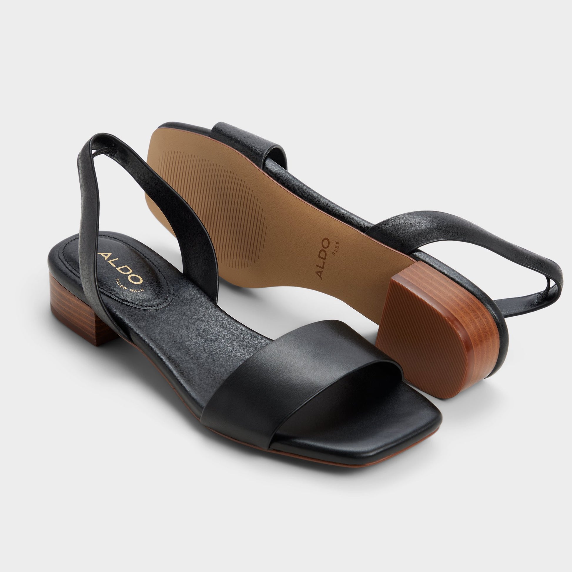 Highlighted view of a pair of Black Dorenna Black strappy sandals