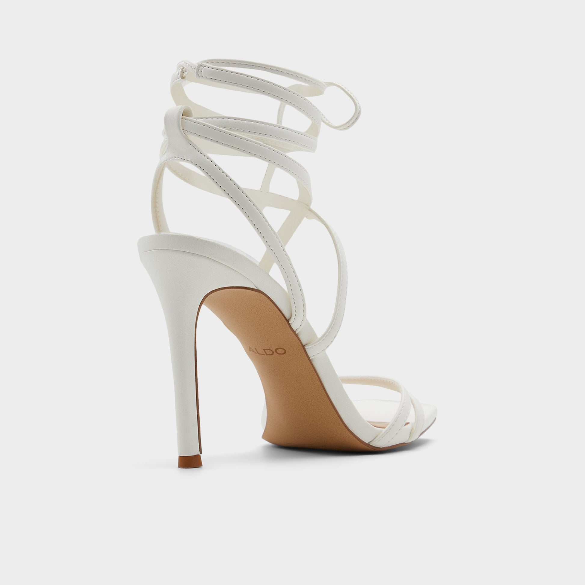 Three-quarter angle of White Phaedra Strappy stiletto sandal's back side