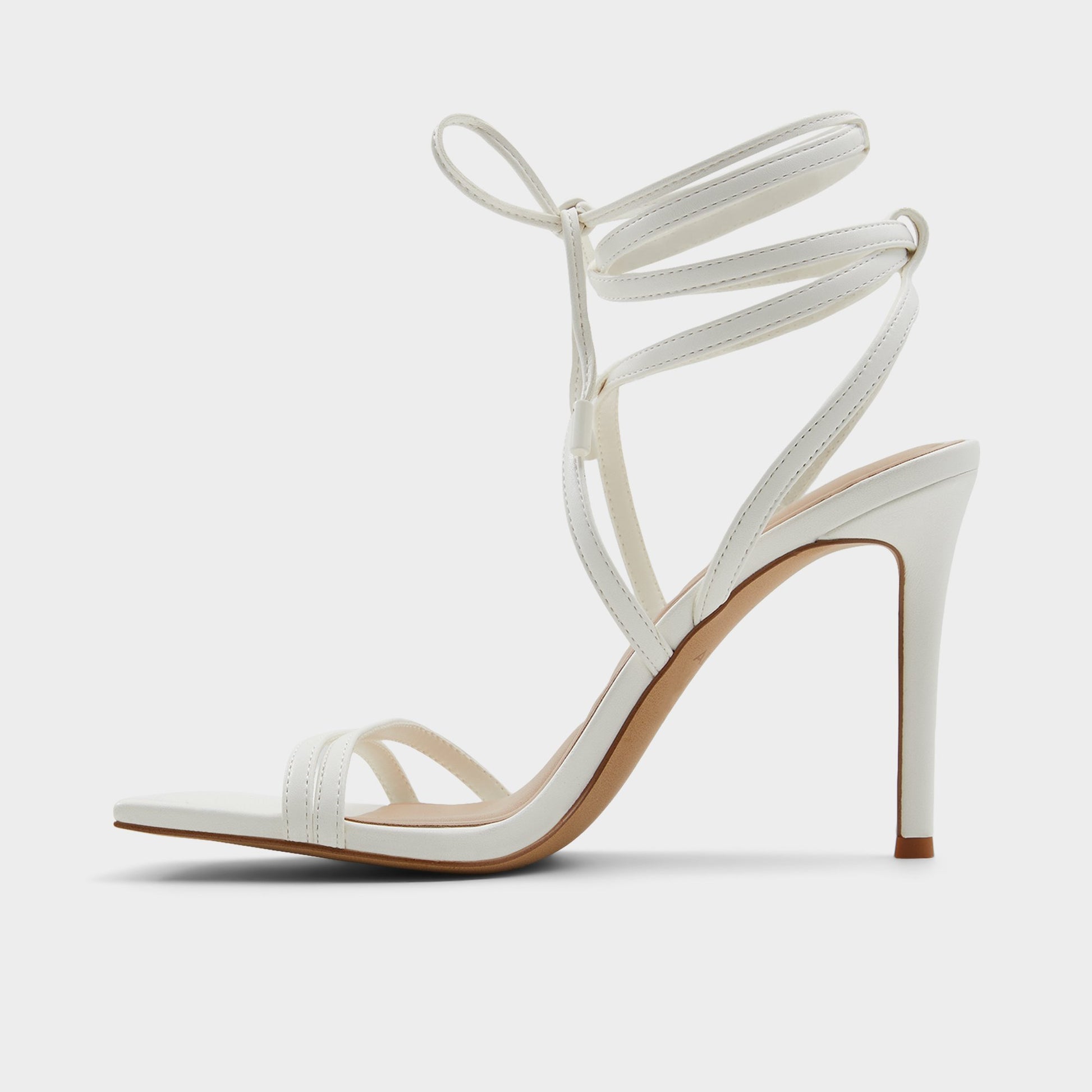 Side view of White Phaedra Strappy stiletto sandal