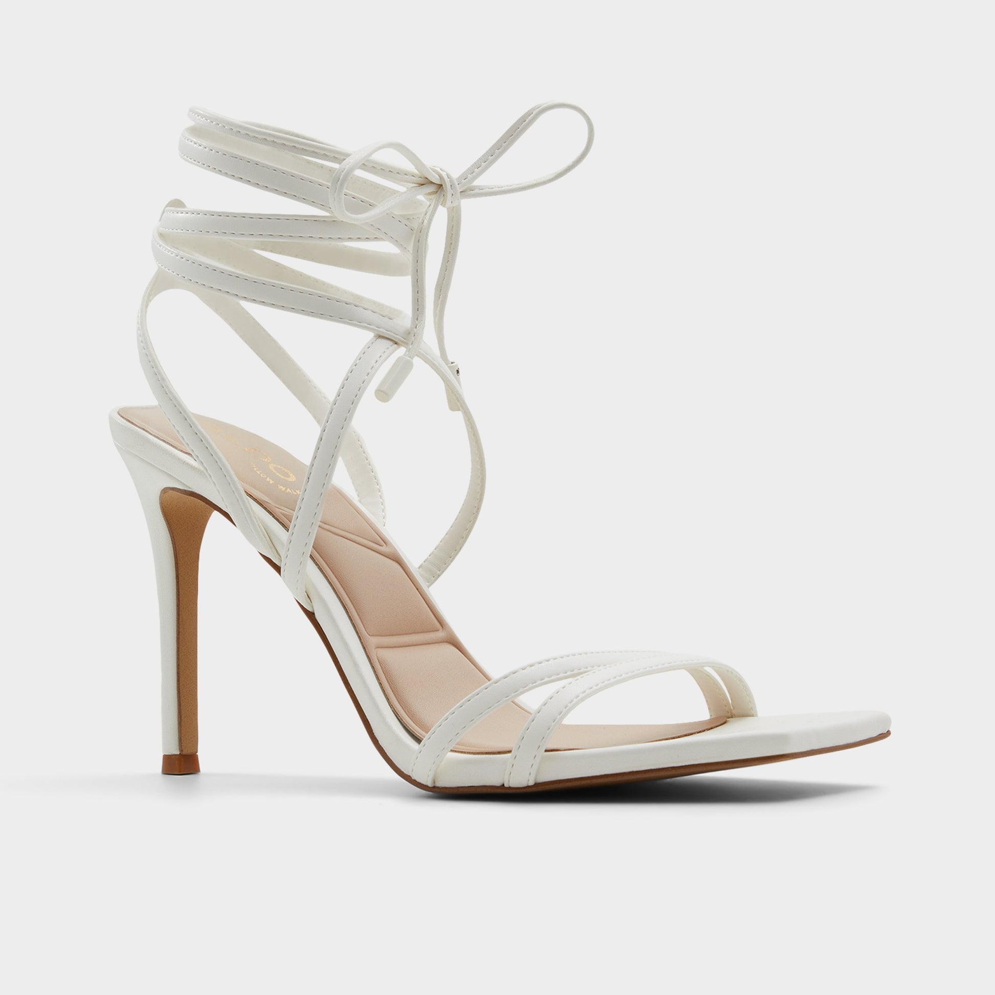 Three-quarter angle of White Phaedra Strappy stiletto sandal's front side