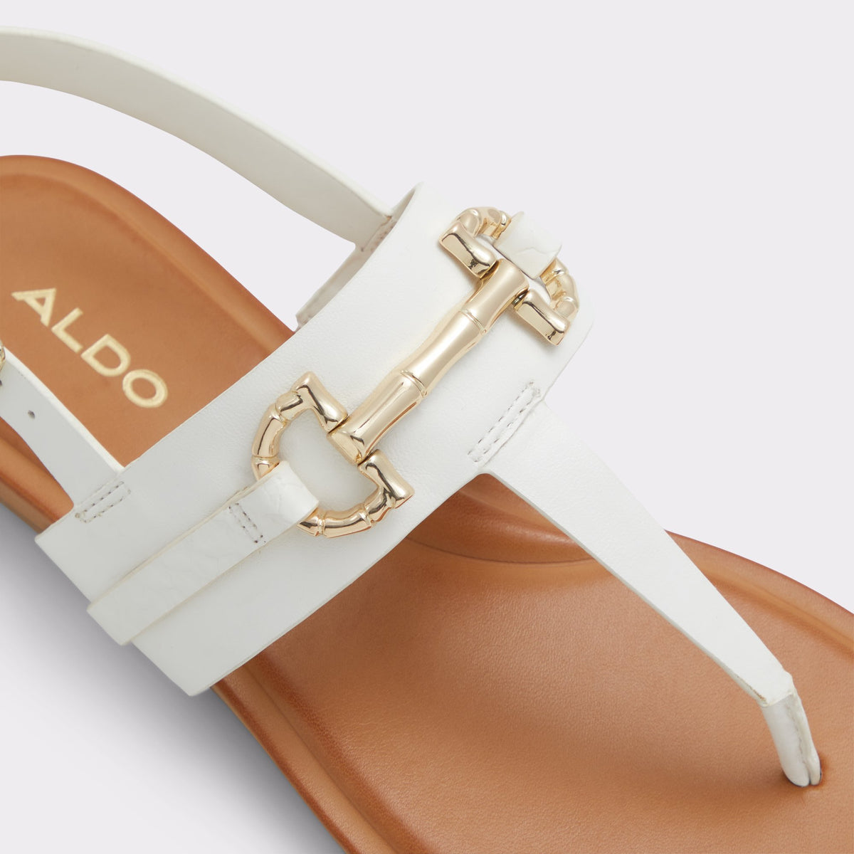Close-up of the Open White Tany T-strap sandal