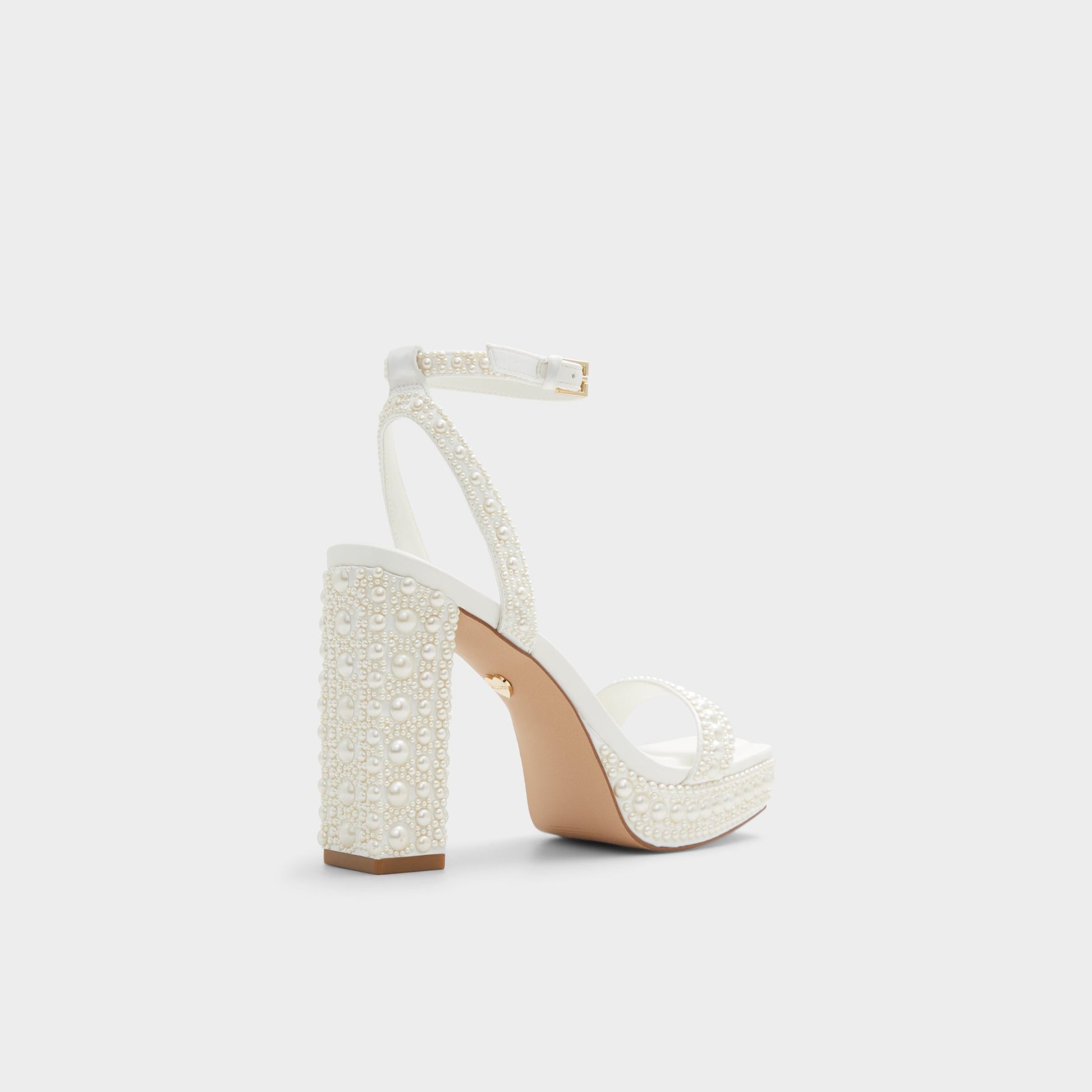 Three-quarter angle of White Lulu Strappy heeled sandal's back side