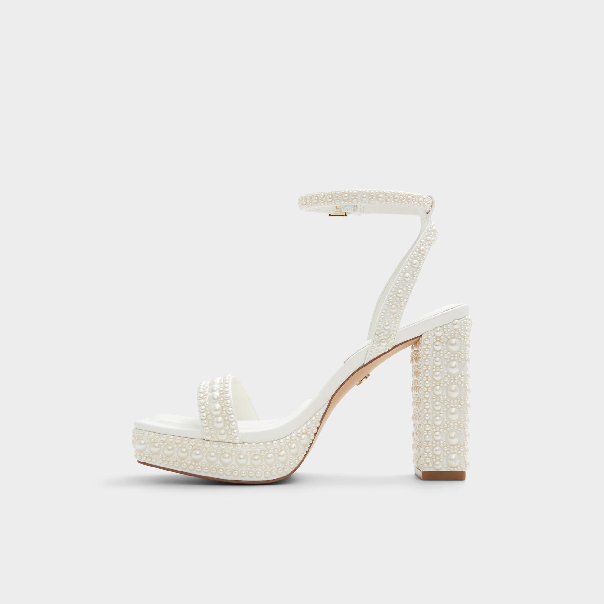 Side view of White Lulu Strappy heeled sandal