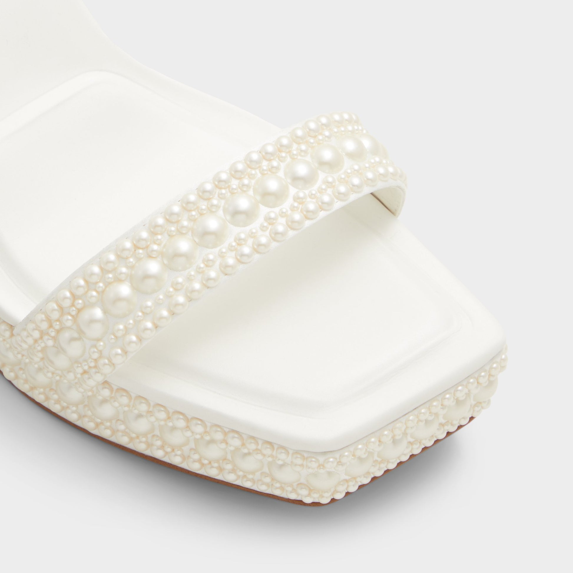 Close-up of the White Lulu Strappy heeled sandal