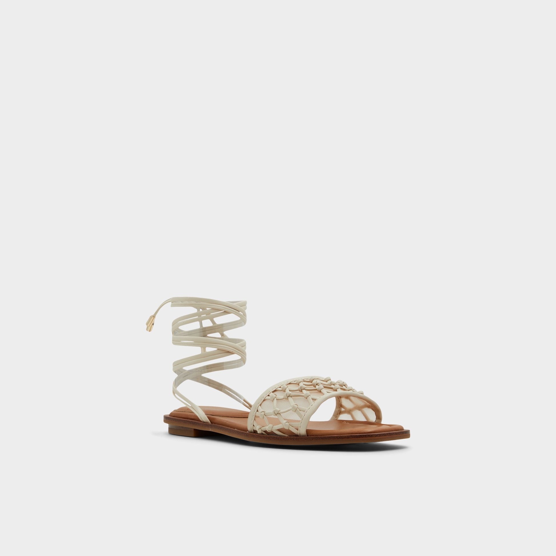Three-quarter angle of Other White Seazen Flat sandal's front side