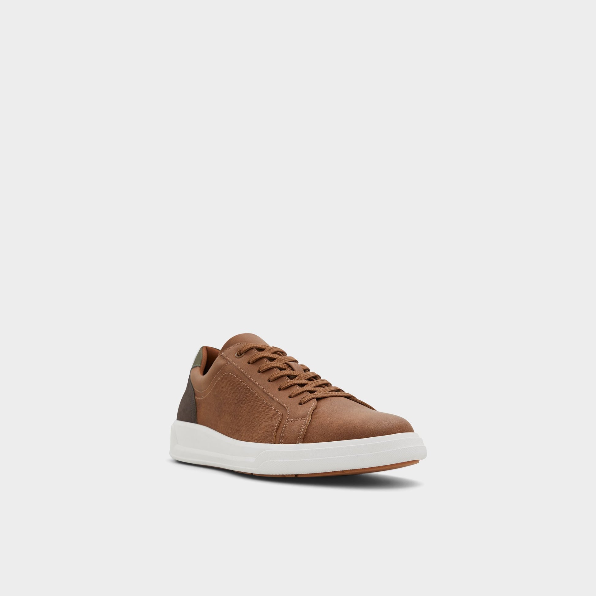 Three-quarter angle of Cognac Ogspec Low top sneaker's front side