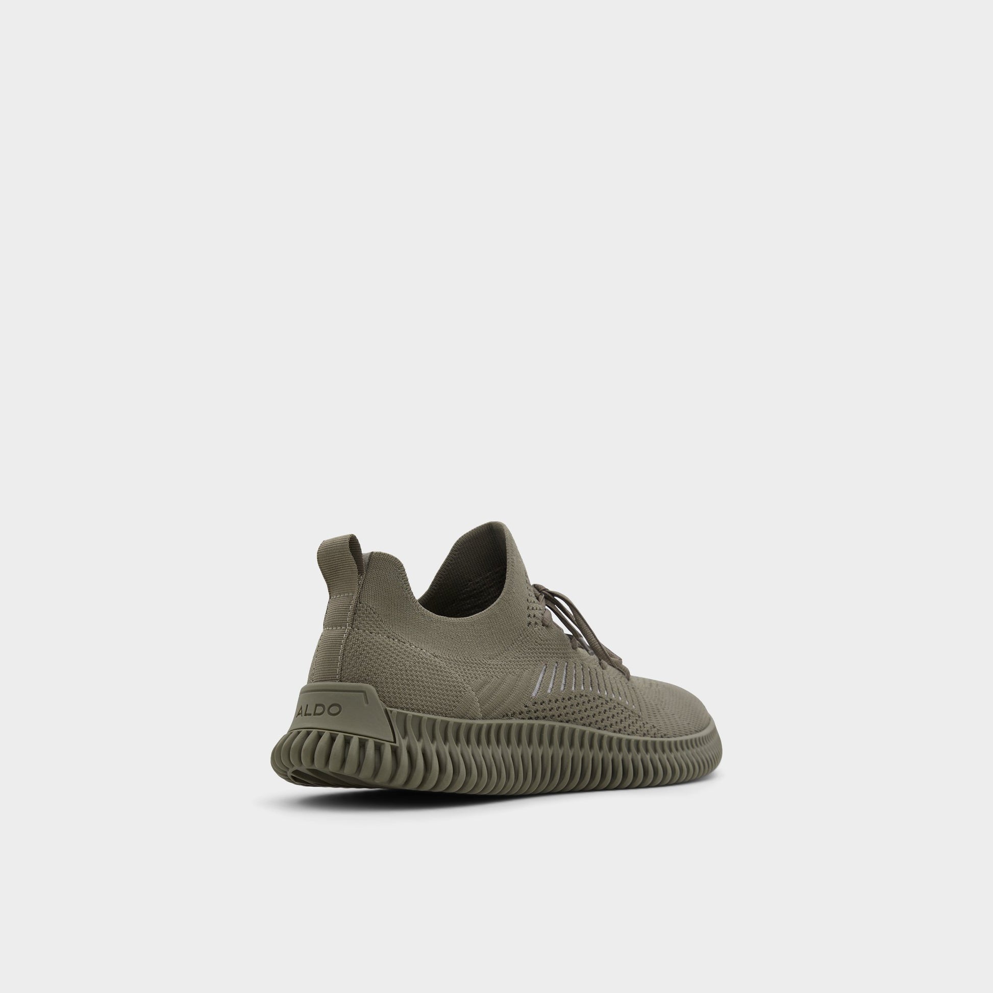 Three-quarter angle of Other Green Gilgai Jogger sneaker's back side