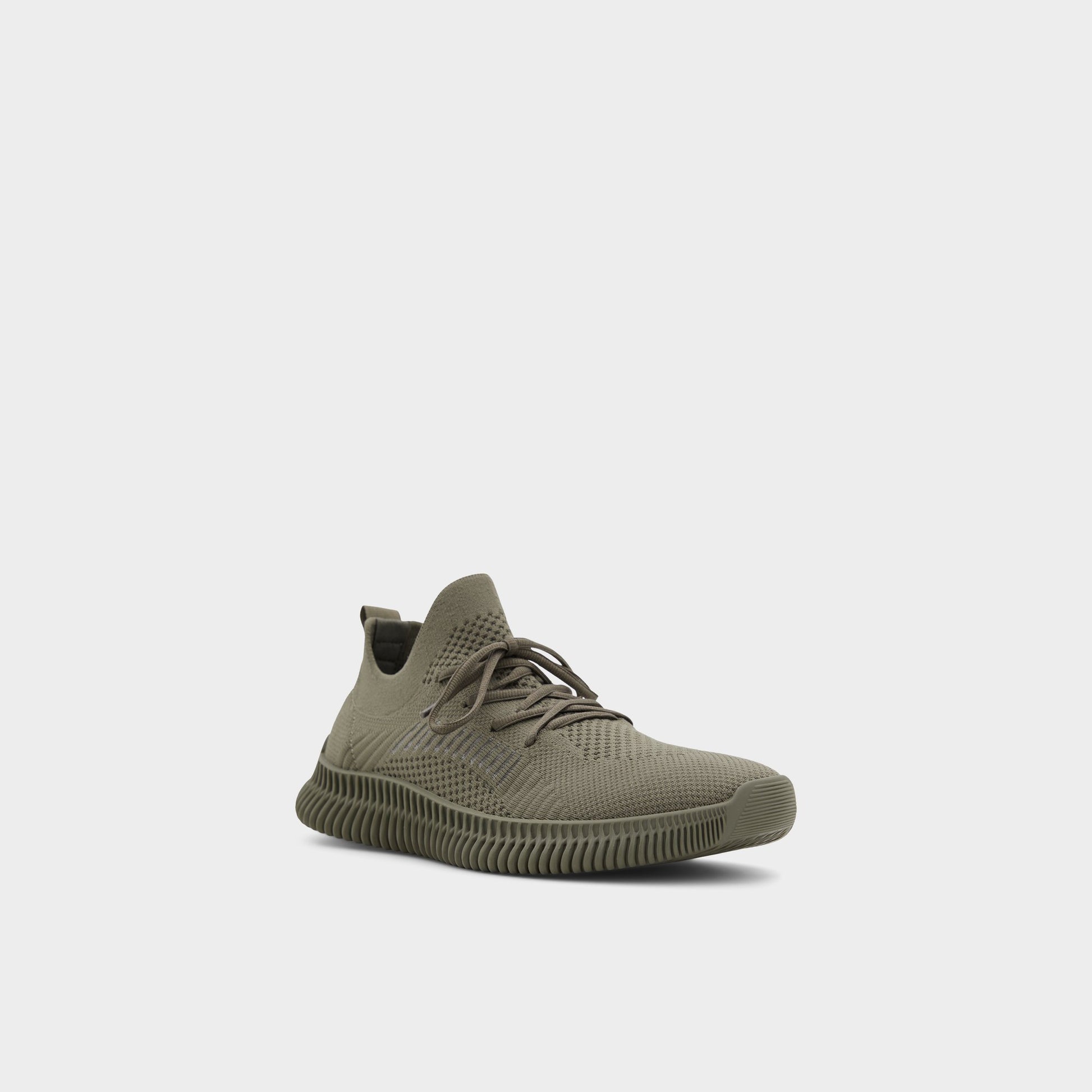 Three-quarter angle of Other Green Gilgai Jogger sneaker's front side