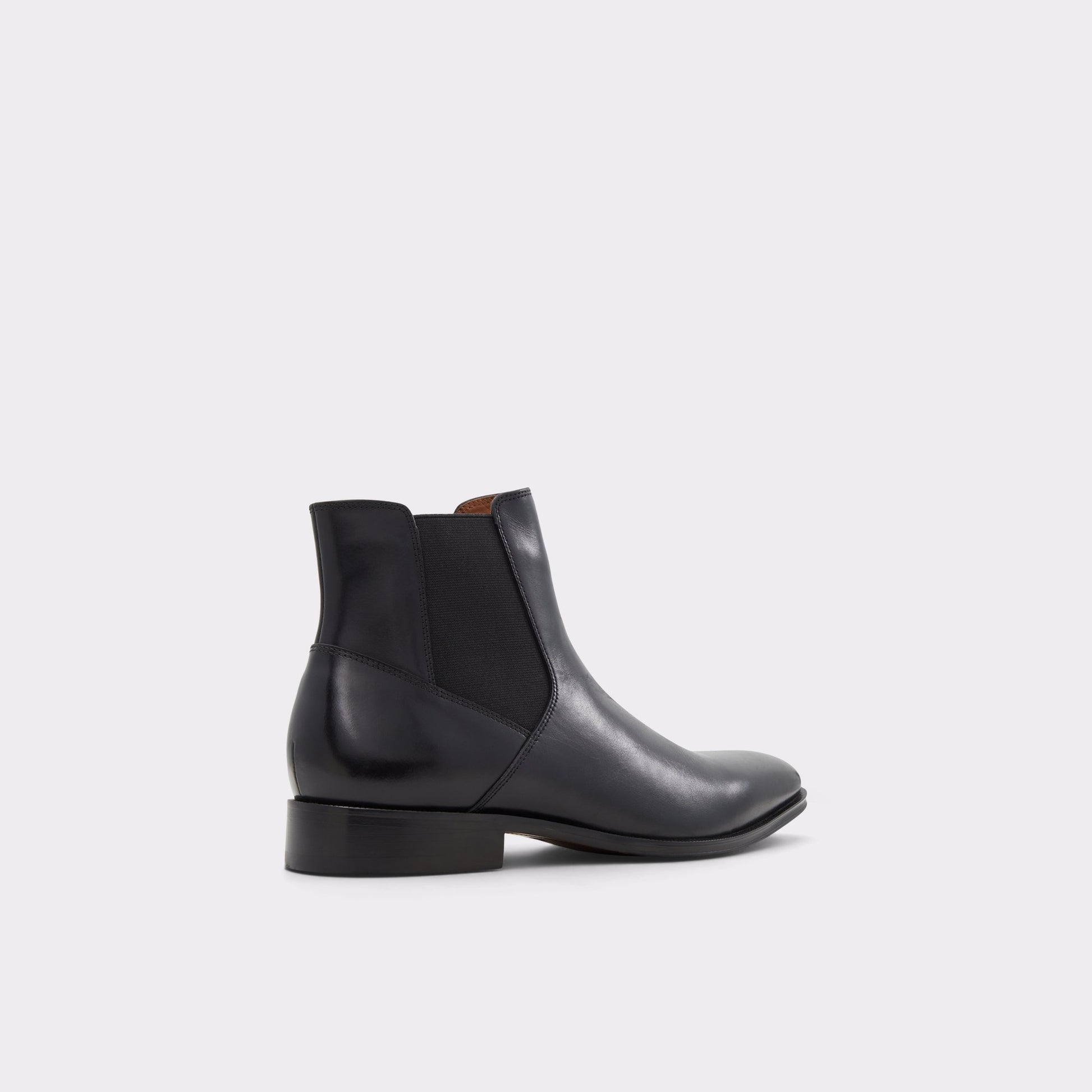 Three-quarter angle of Black Heaton Chelsea boot's back side