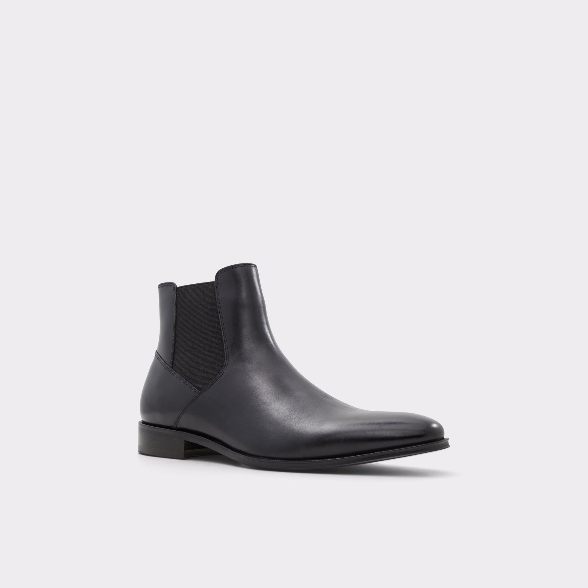 Three-quarter angle of Black Heaton Chelsea boot's front side