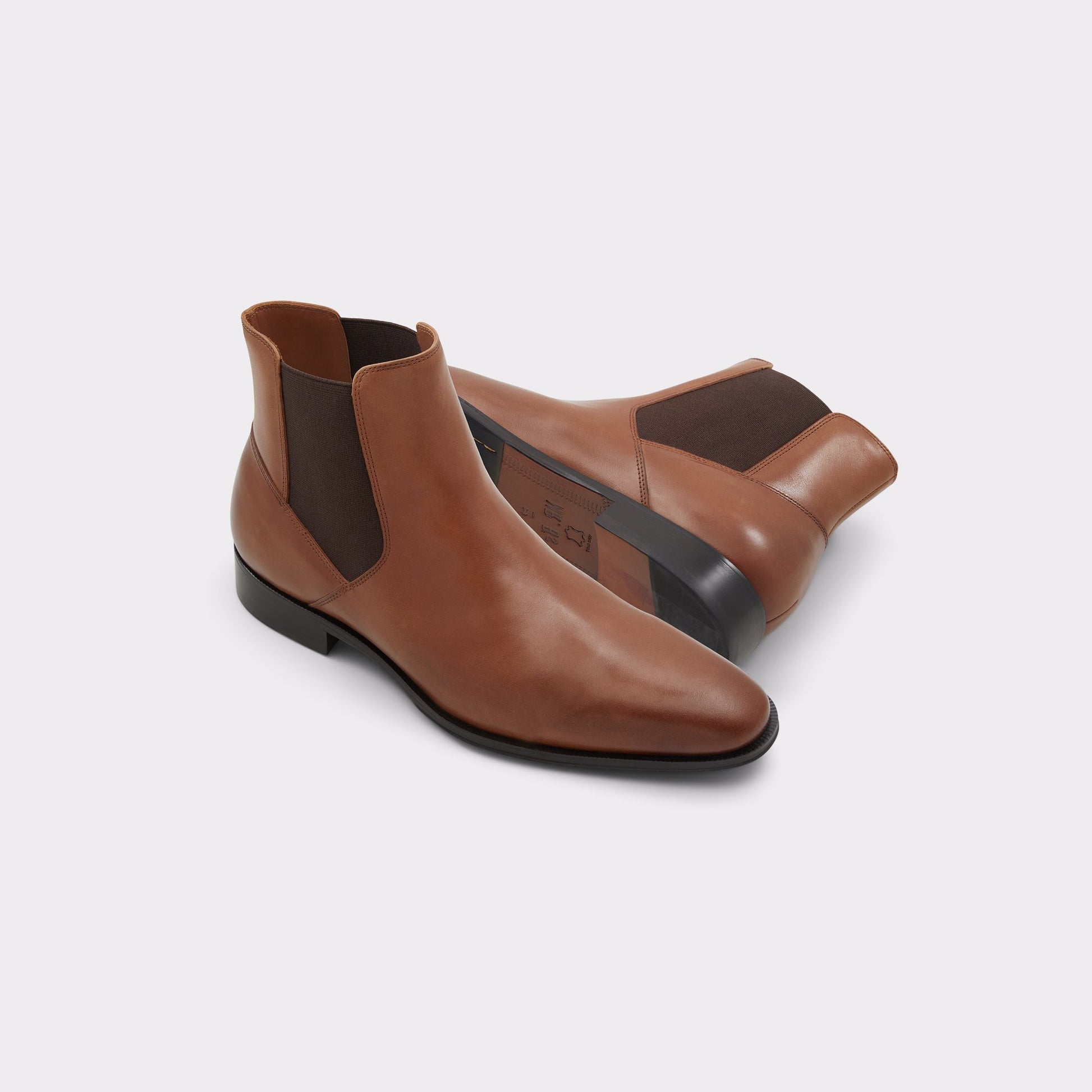 Highlighted view of a pair of Cognac Heaton Chelsea boots