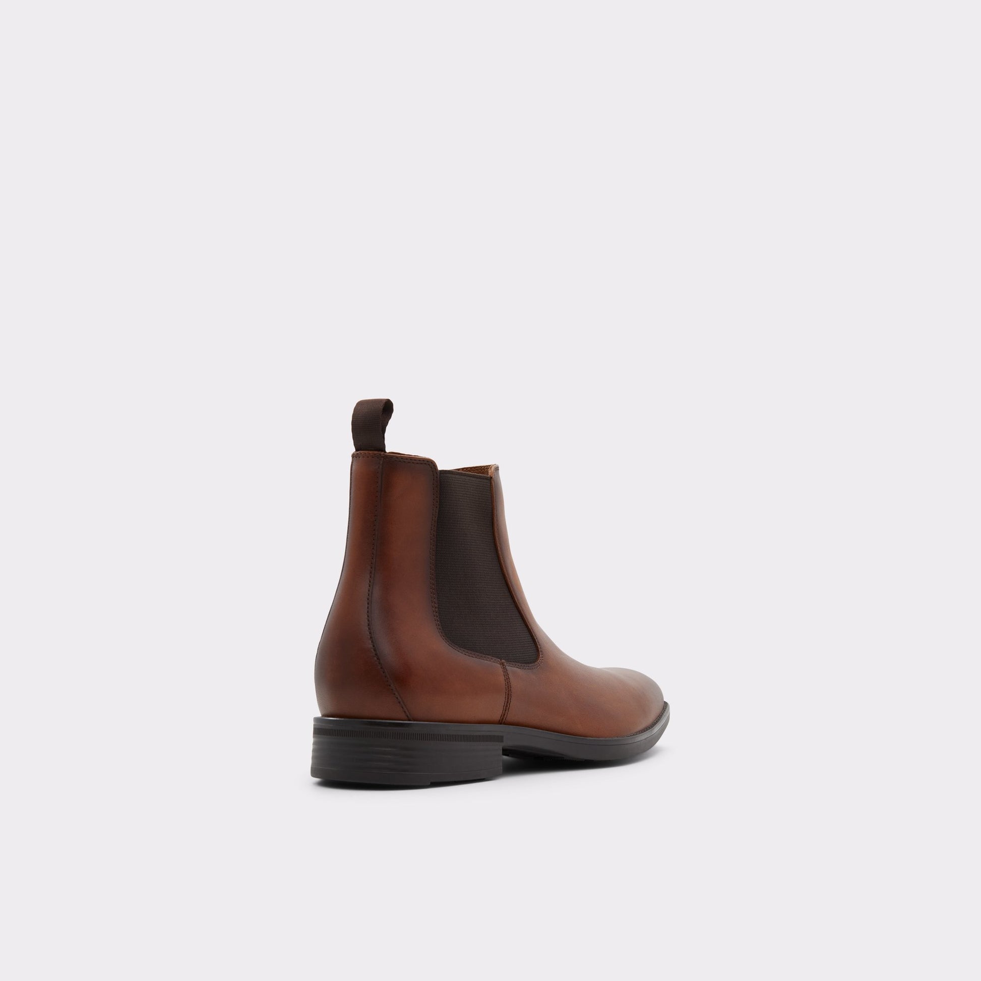 Three-quarter angle of Cognac Chambers Chelsea boot's back side