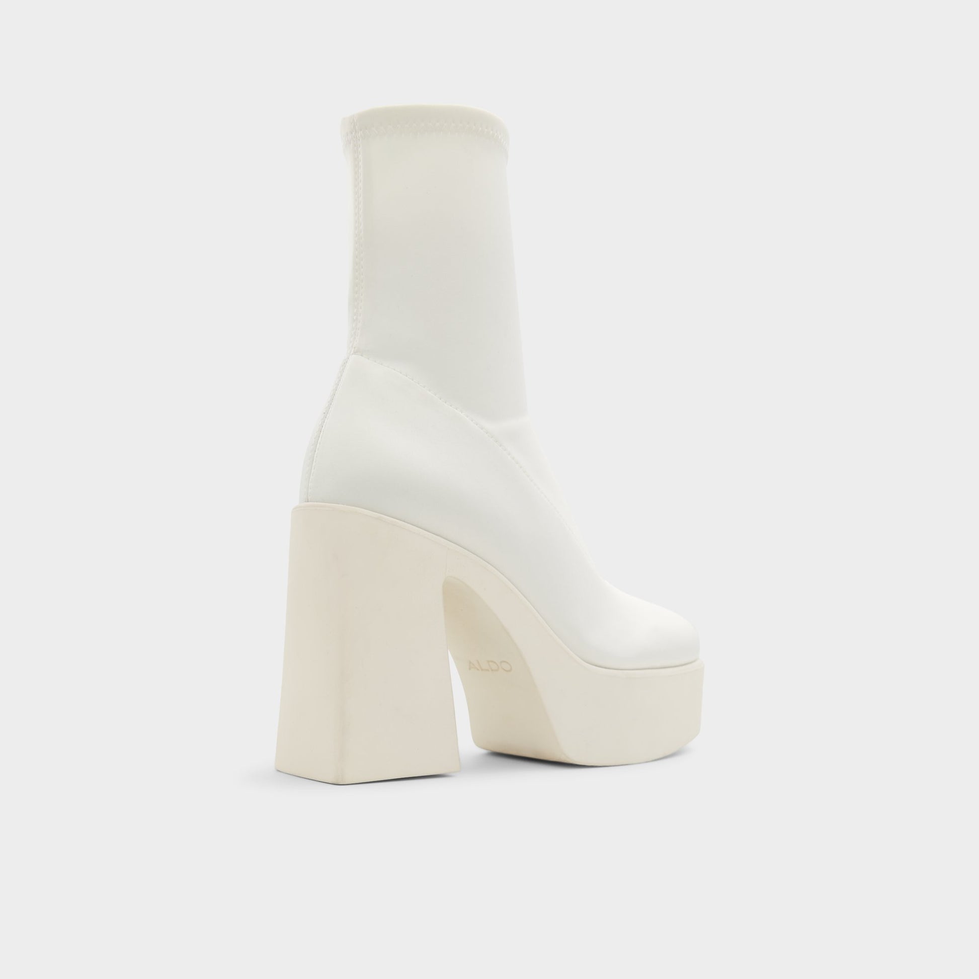 Three-quarter angle of White/Bone Grandstep Ankle boot's back side