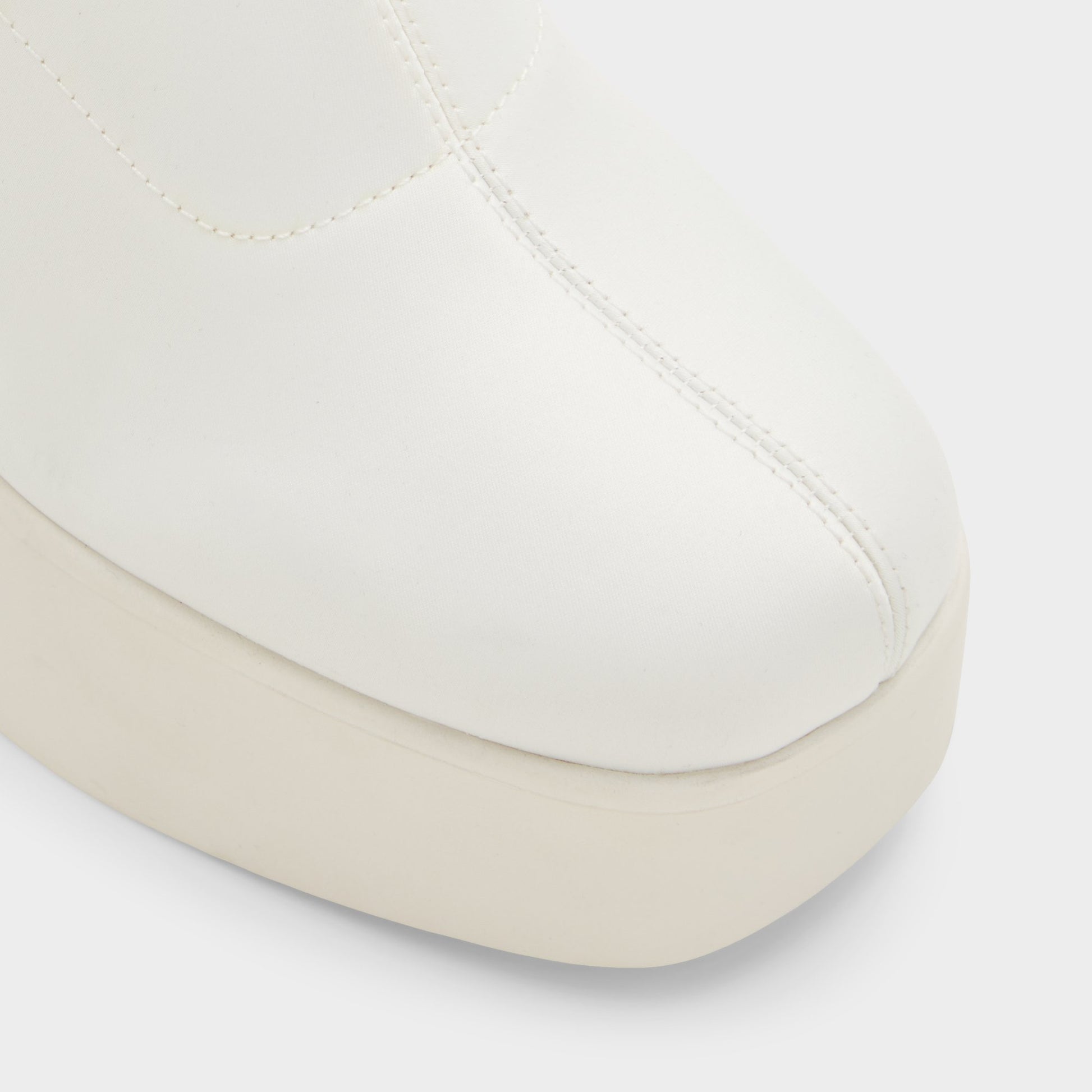 Close-up of the White/Bone Grandstep Ankle boot