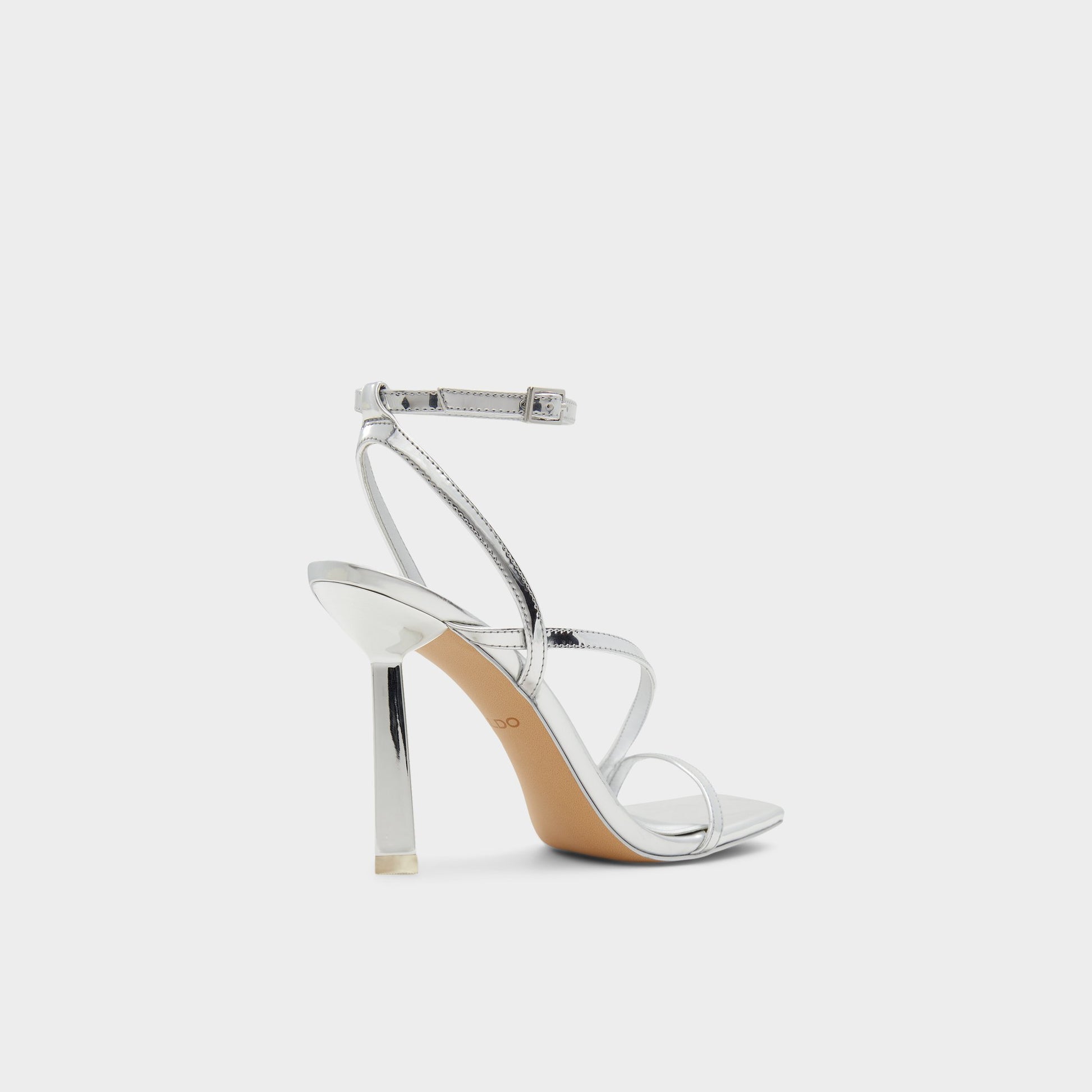 Three-quarter angle of Silver Scintilla Strappy heeled sandal's back side