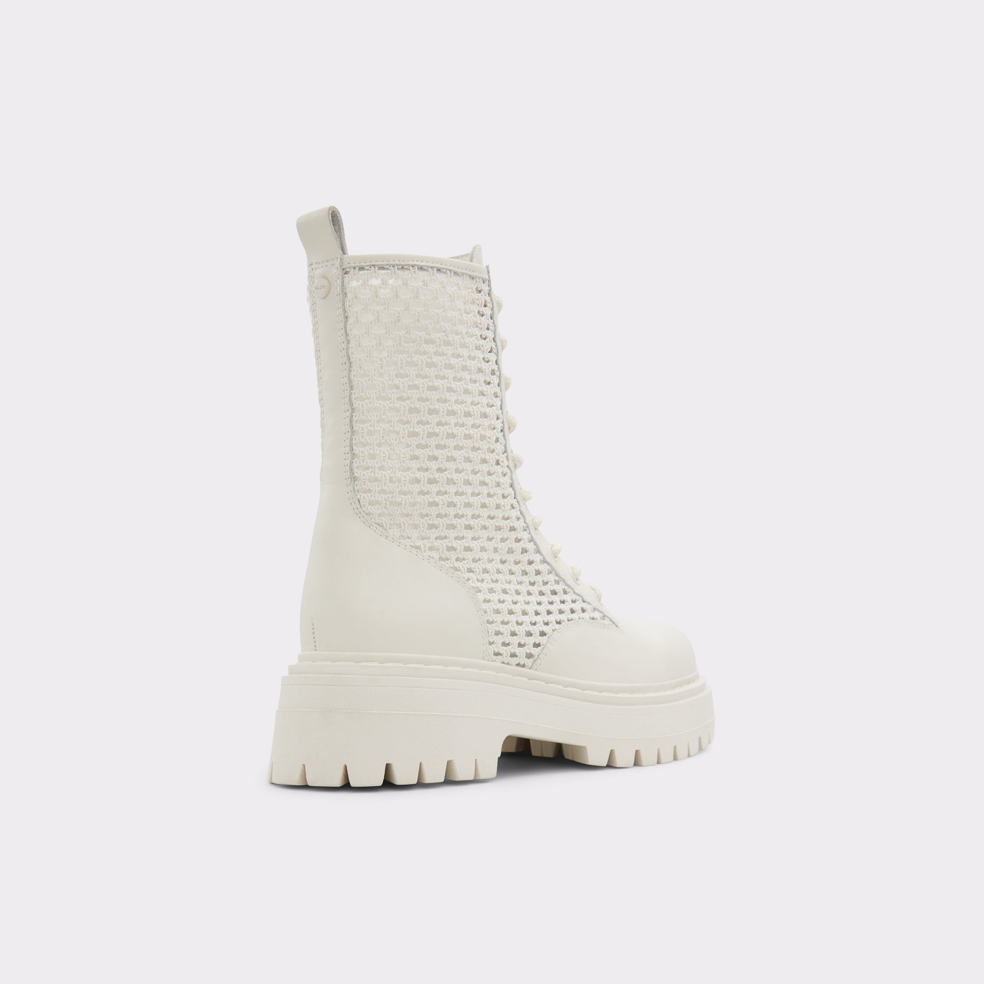 Three-quarter angle of Open White Aryn Combat ankle boot's back side
