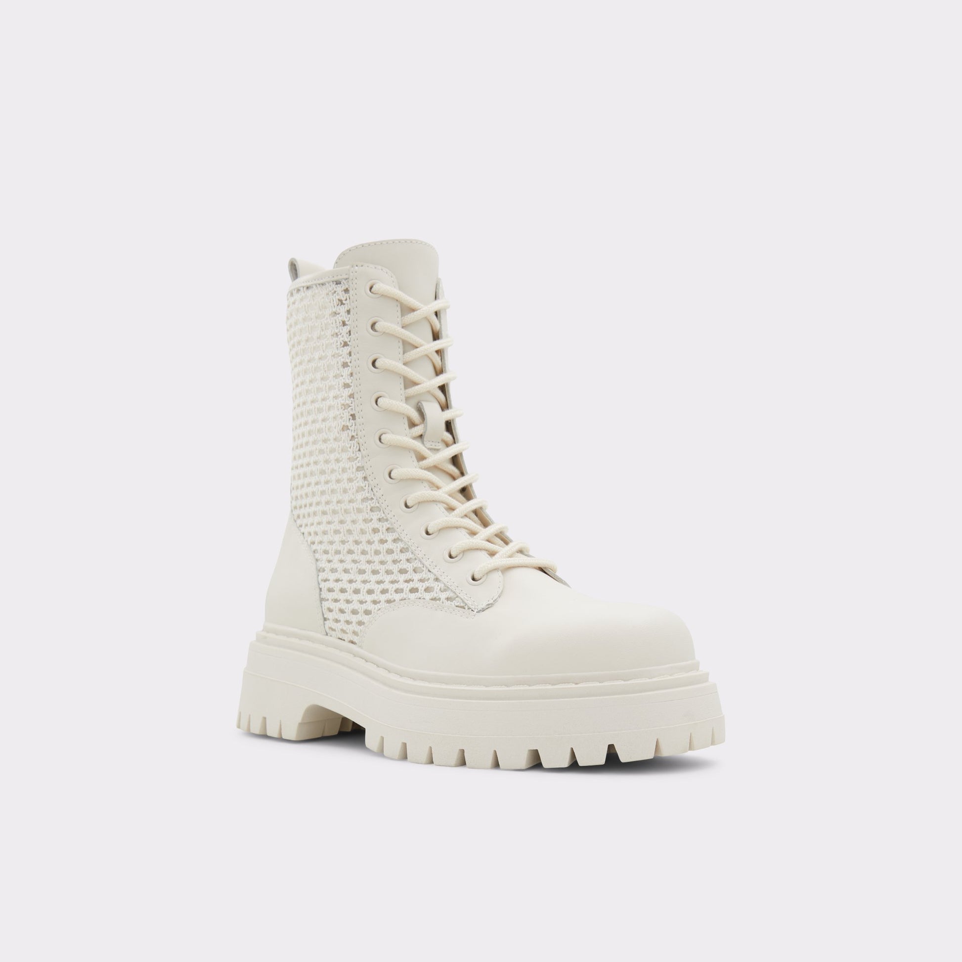 Three-quarter angle of Open White Aryn Combat ankle boot's front side