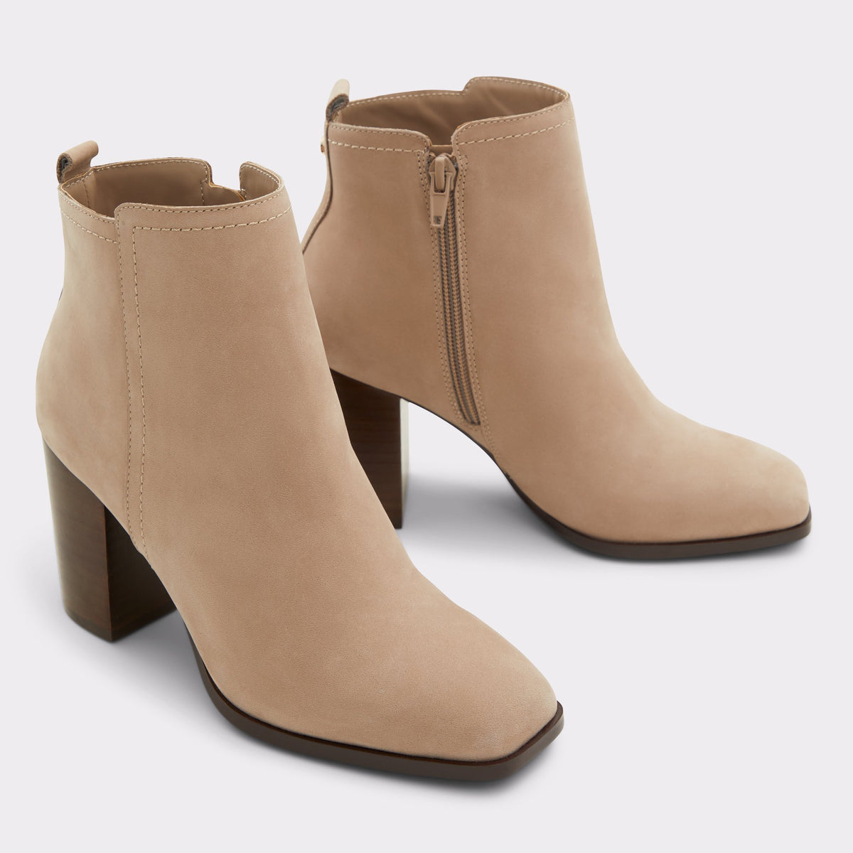 Highlighted view of a pair of Other Dark Beige Reva Ankle boots