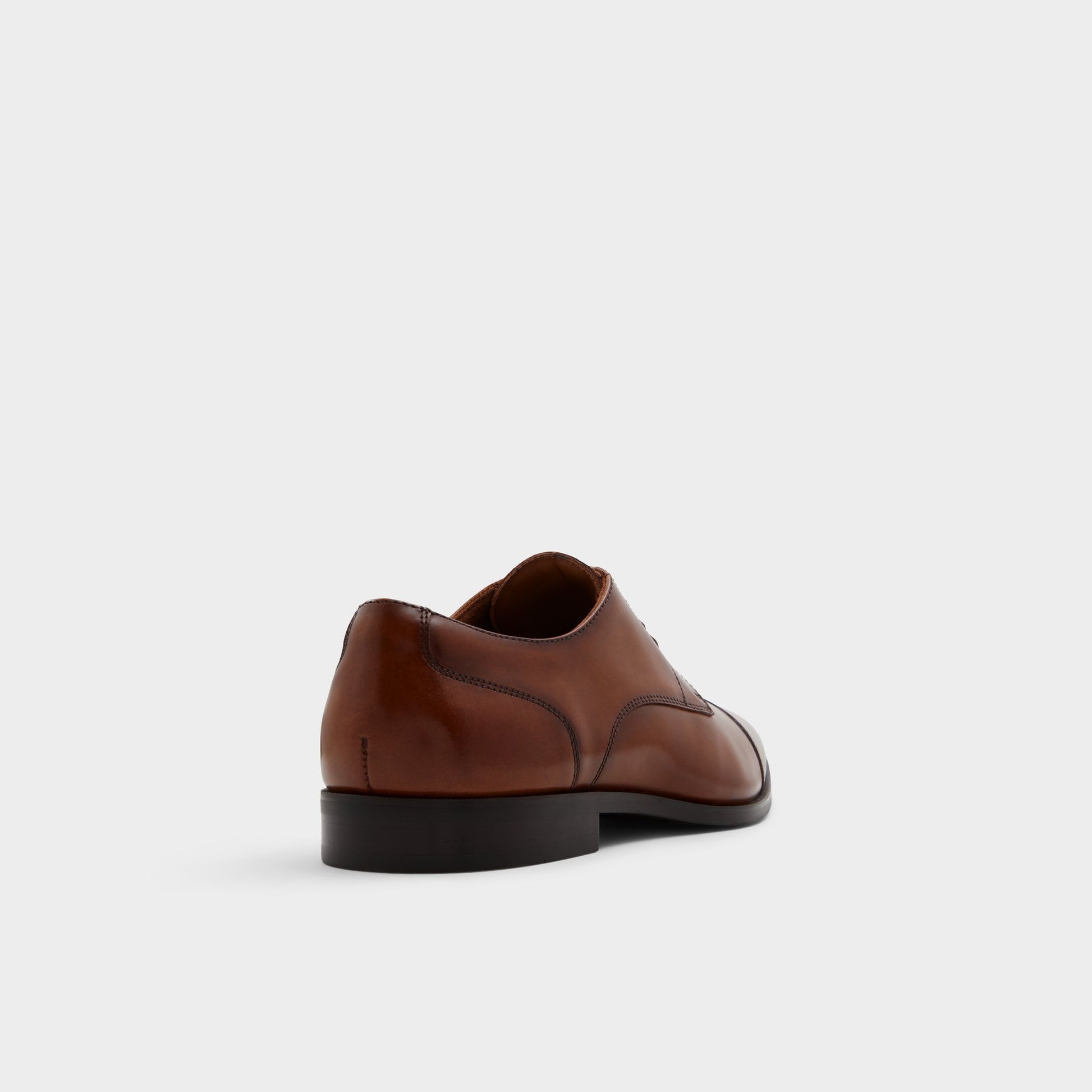 Three-quarter angle of Cognac Callahan Derby shoe's back side
