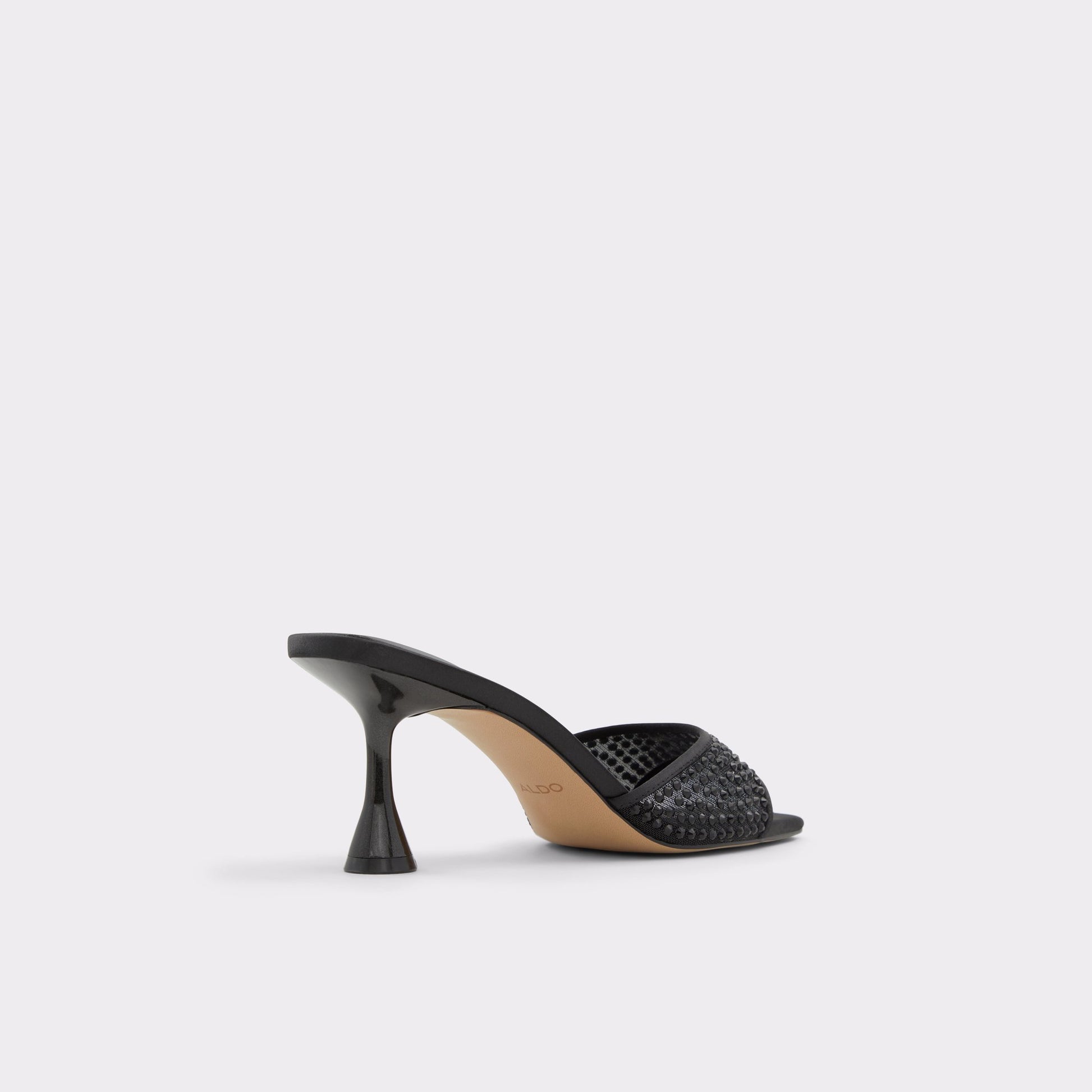 Three-quarter angle of Black Agatha Heeled mule's back side