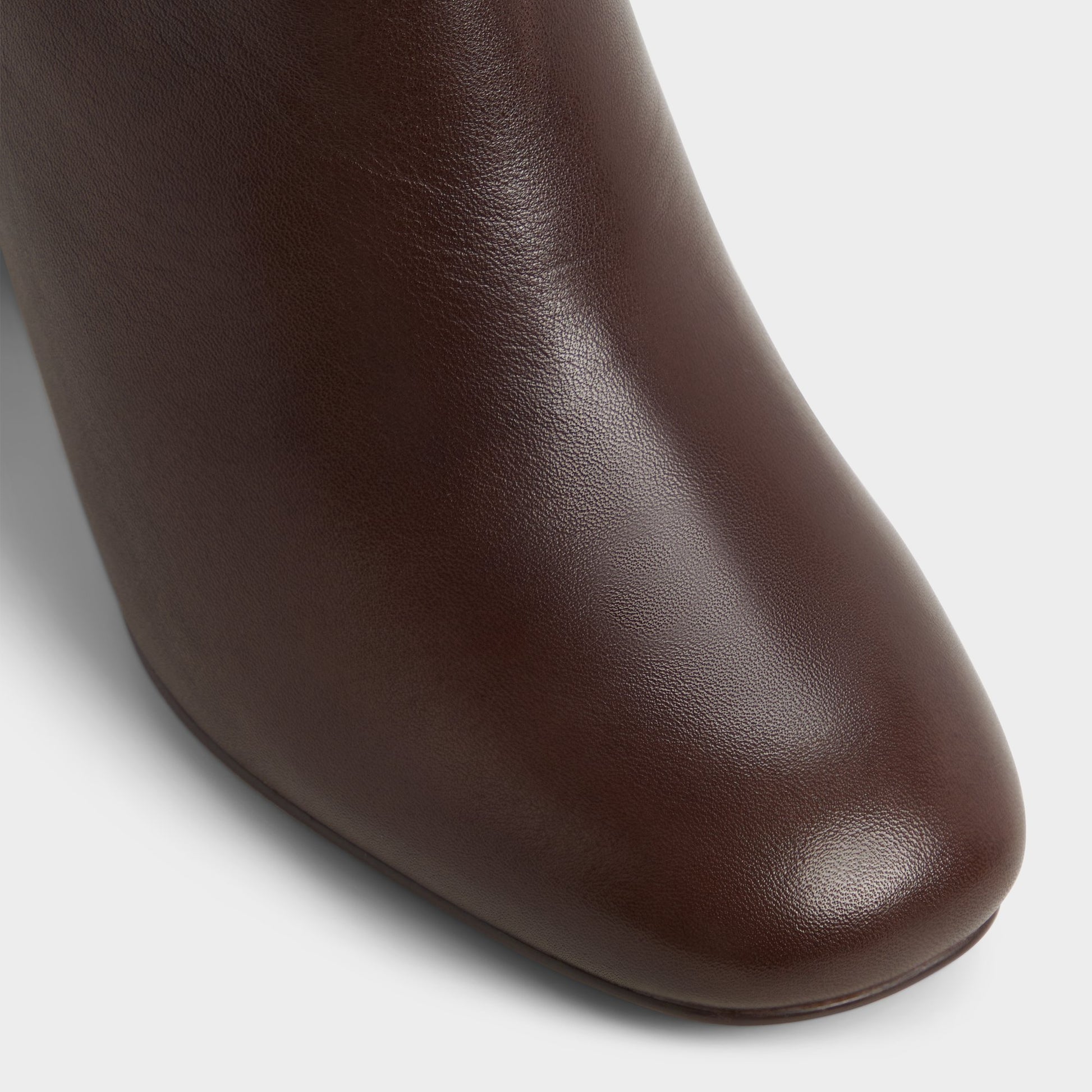 Close-up of the Brown overflow Satori Knee-high boot