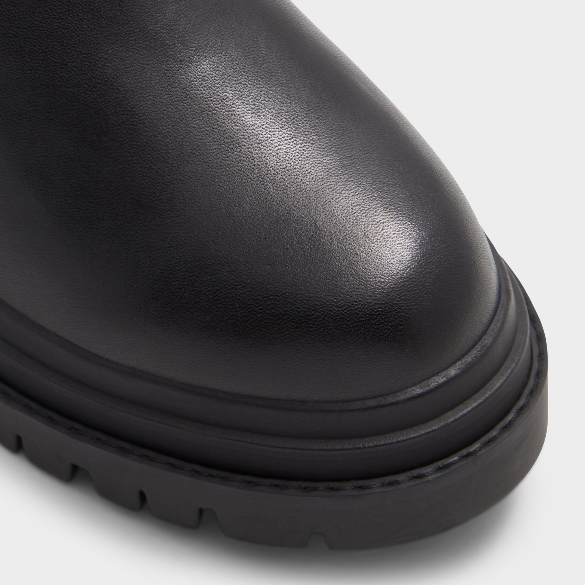 Close-up of the Black Sometta Knee-high boot