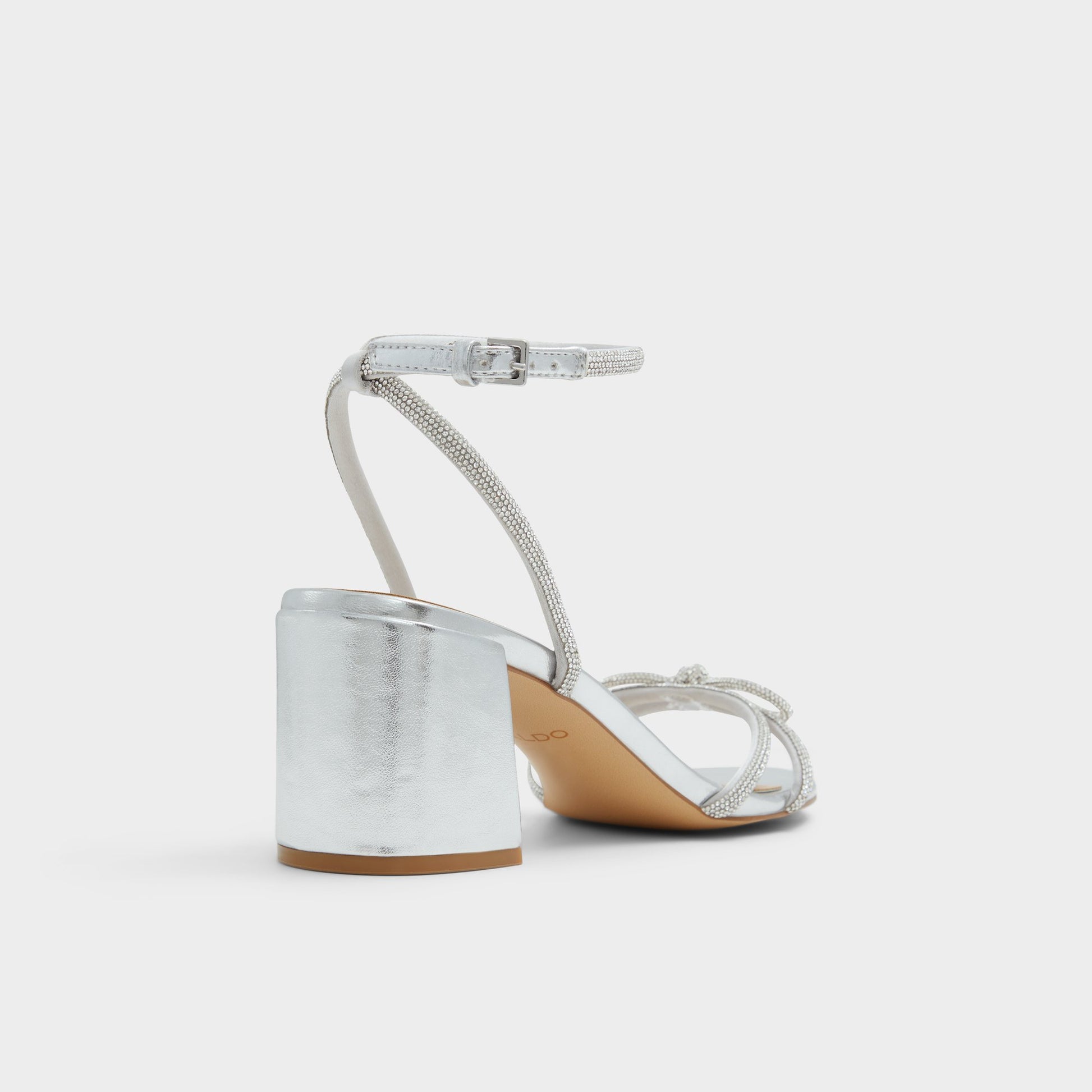 Three-quarter angle of Silver Bouclette Strappy heeled sandal's back side