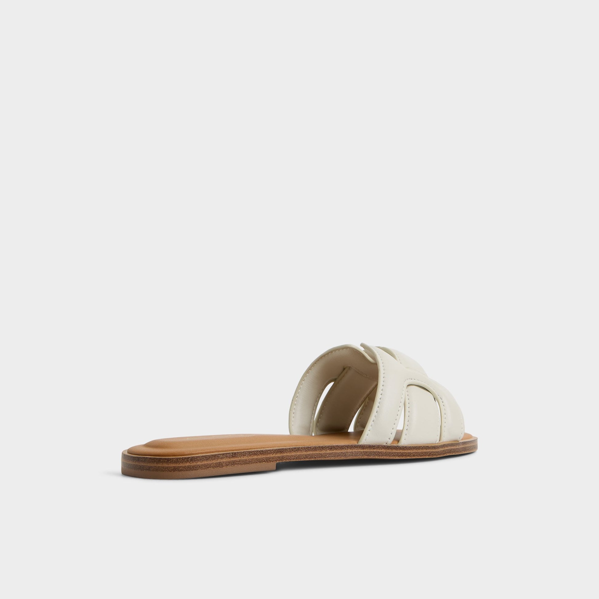 Three-quarter angle of White/Bone Elenaa Slide sandal's back side