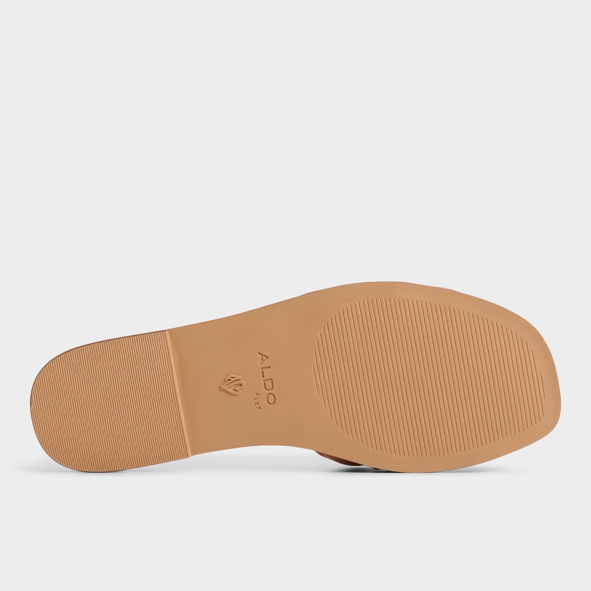 View of White/Bone Elenaa Slide sandal's sole