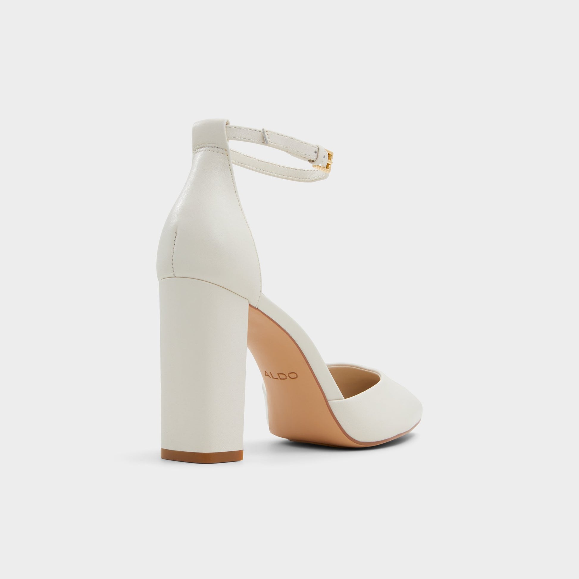Three-quarter angle of White/bone Faith Strappy heeled shoe's back side