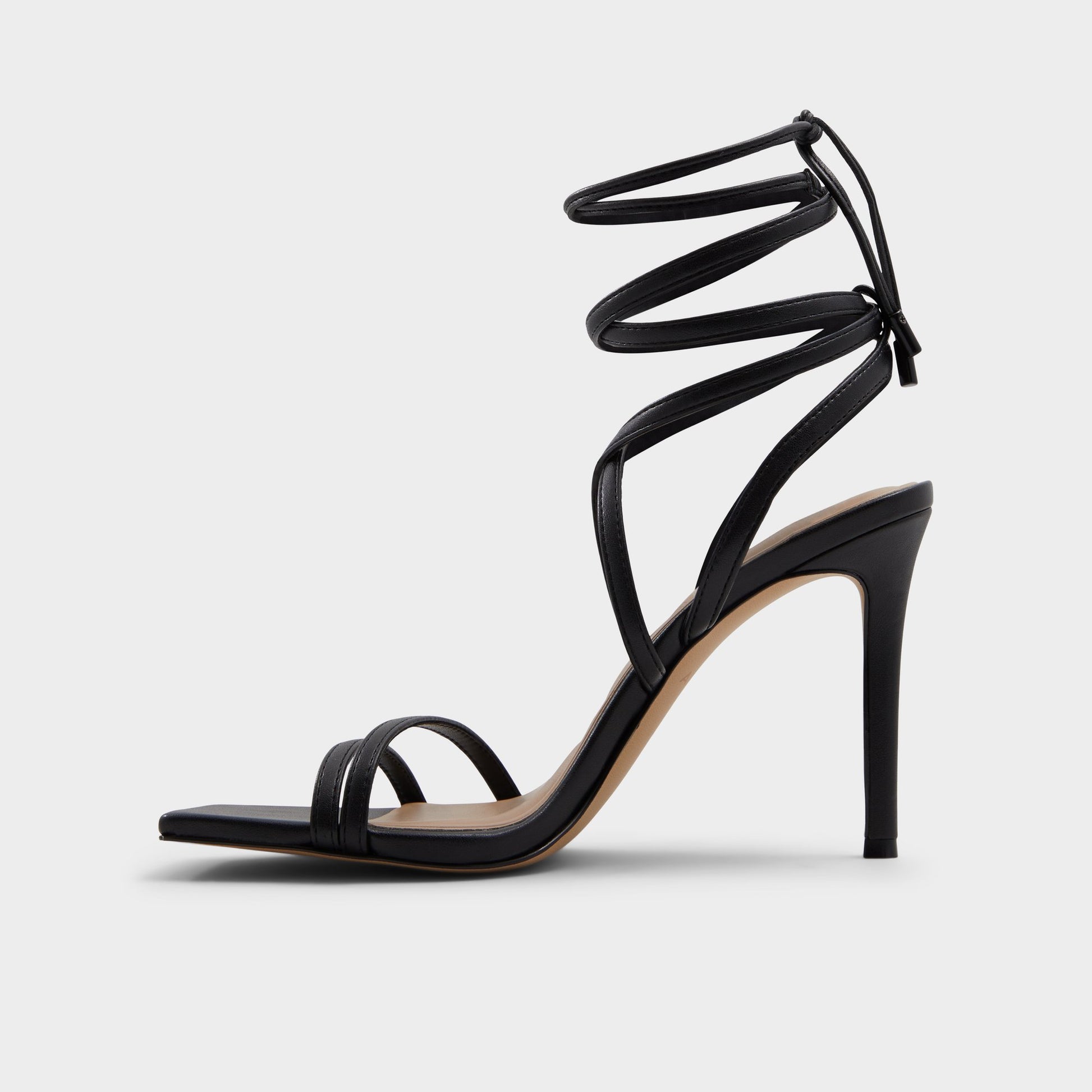 Side view of Black Phaedra Black strappy stiletto sandal