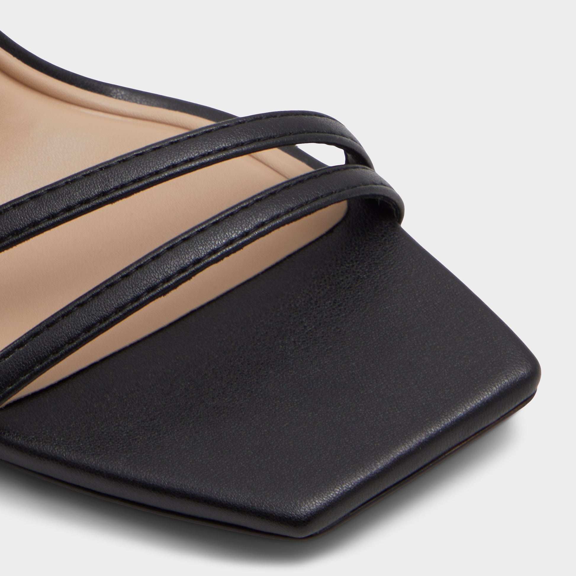 Close-up of the Black Phaedra Black strappy stiletto sandal