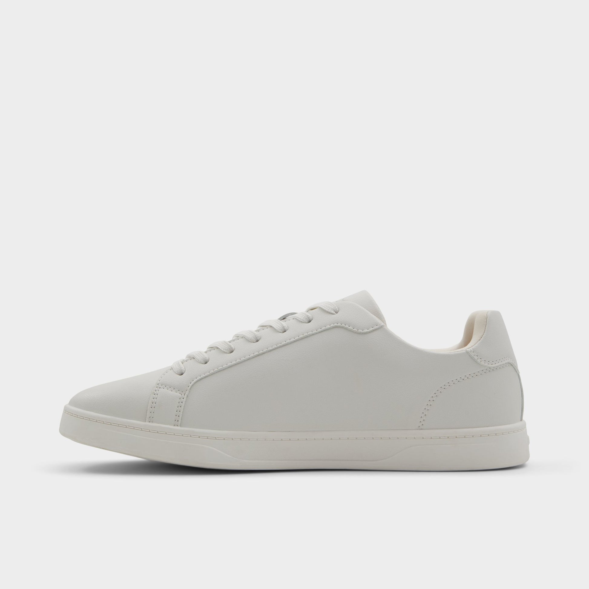 Side view of White Oscar Low top sneaker