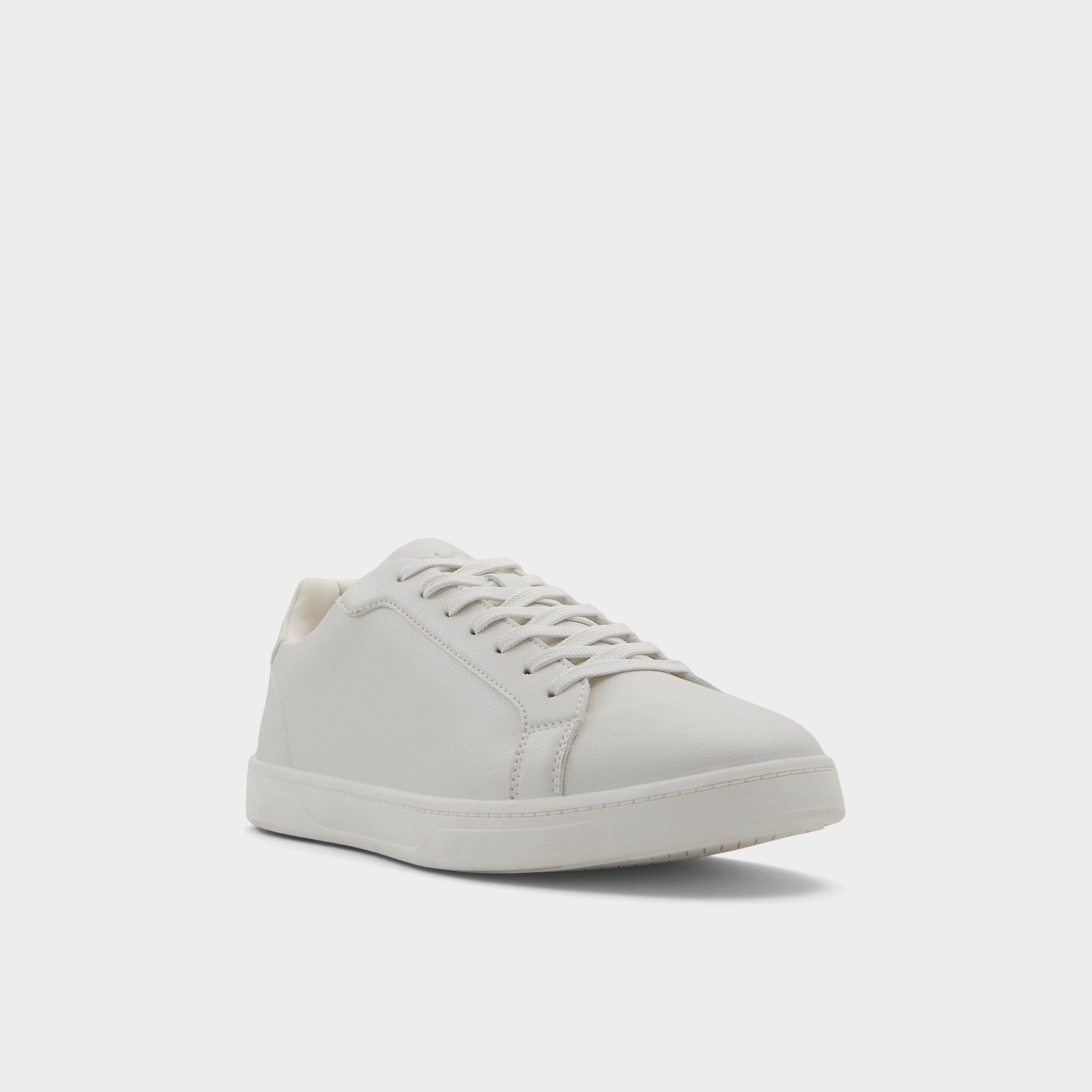 Three-quarter angle of White Oscar Low top sneaker's front side