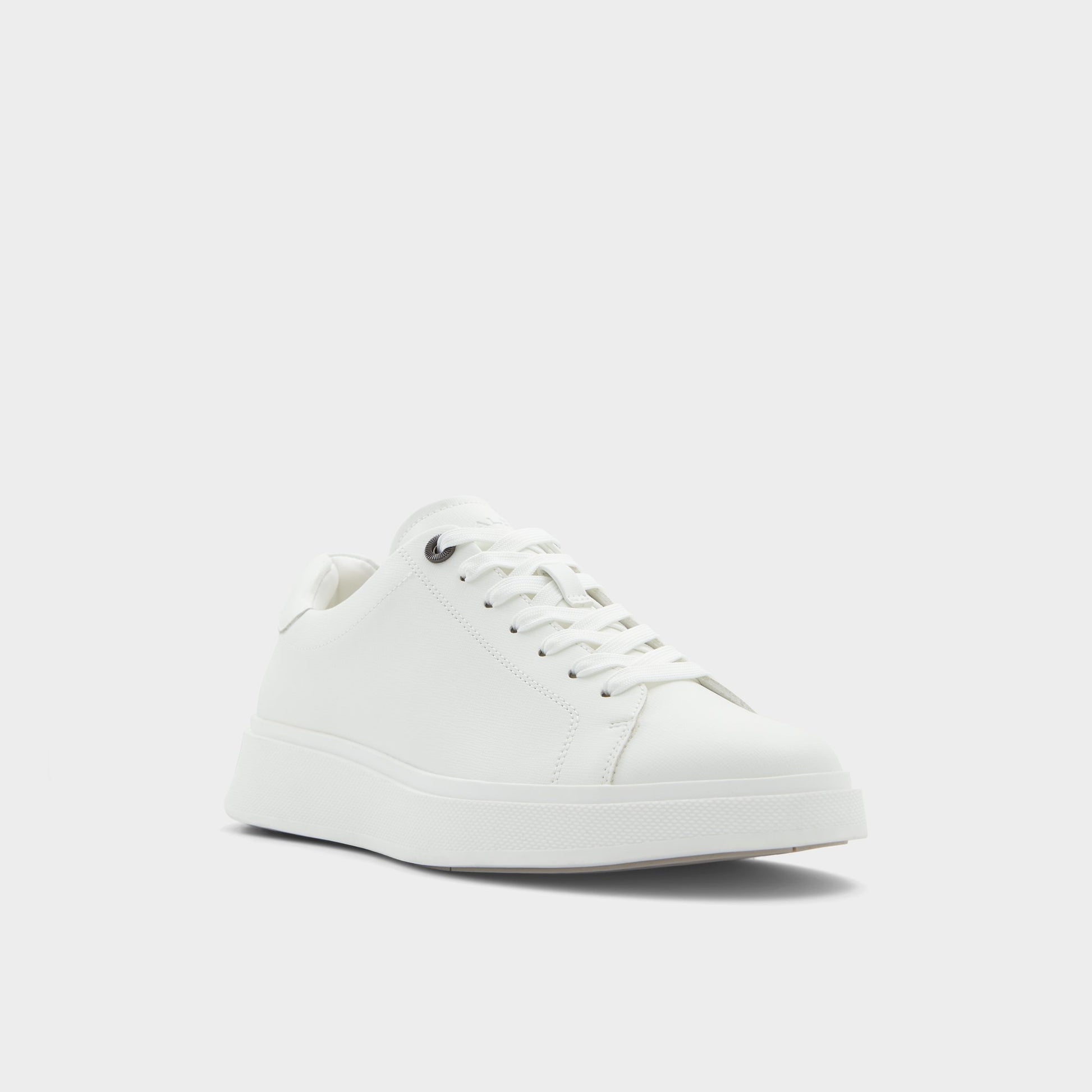 Three-quarter angle of Natural Magnus Low top sneaker's front side