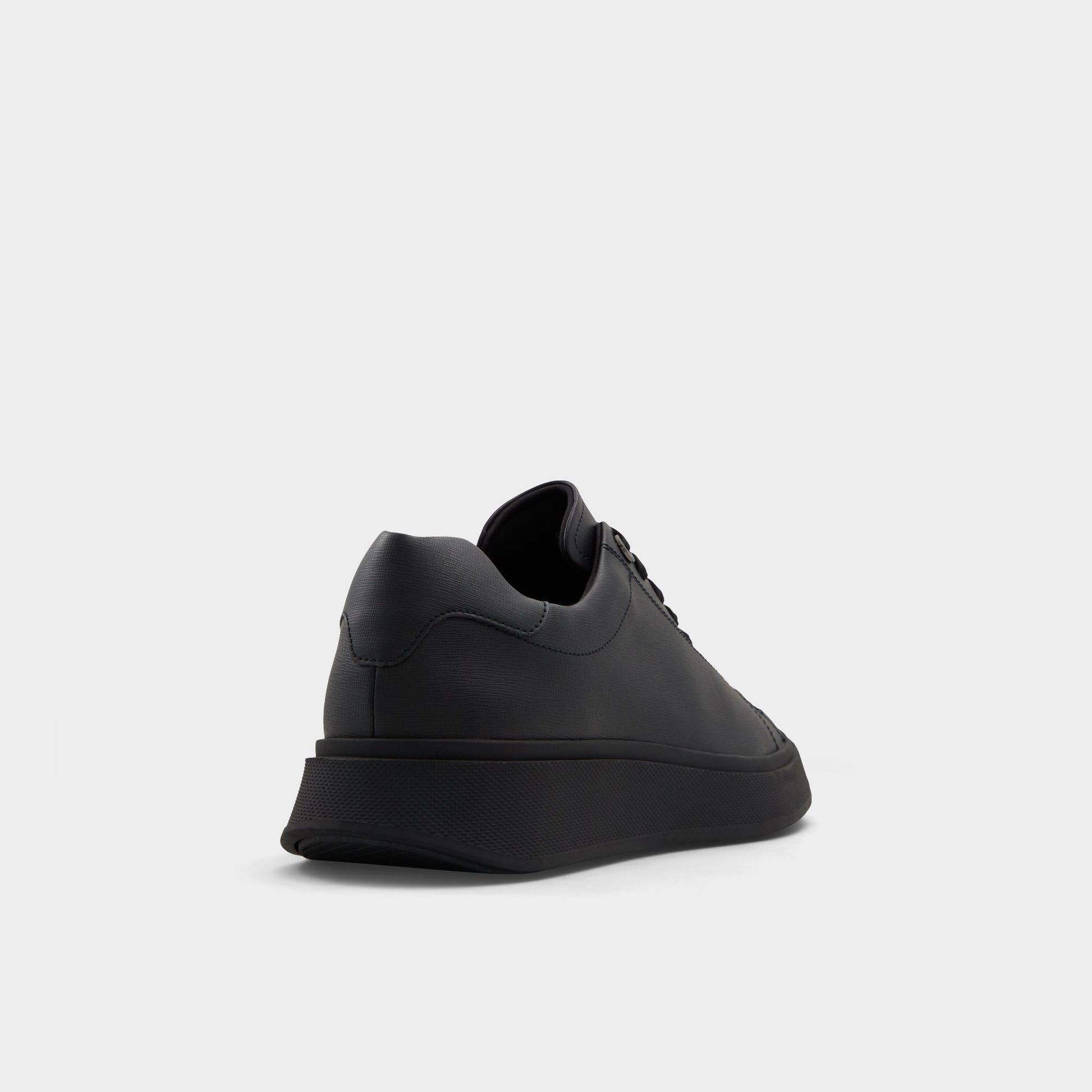 Three-quarter angle of Open Black Magnus Low top sneaker's back side